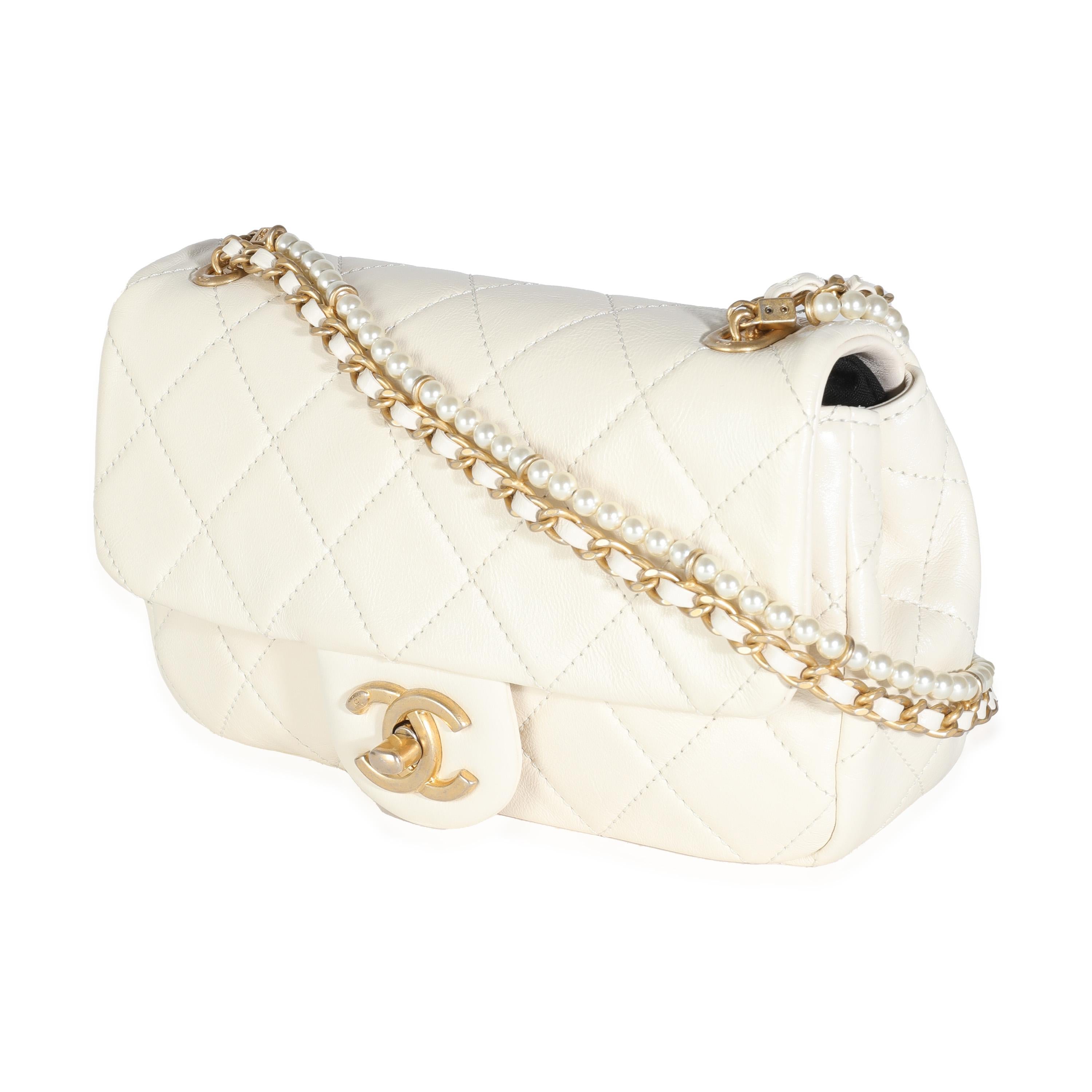 Women's or Men's Chanel White Shiny Quilted Lambskin Pearl Chain Mini Flap Bag For Sale
