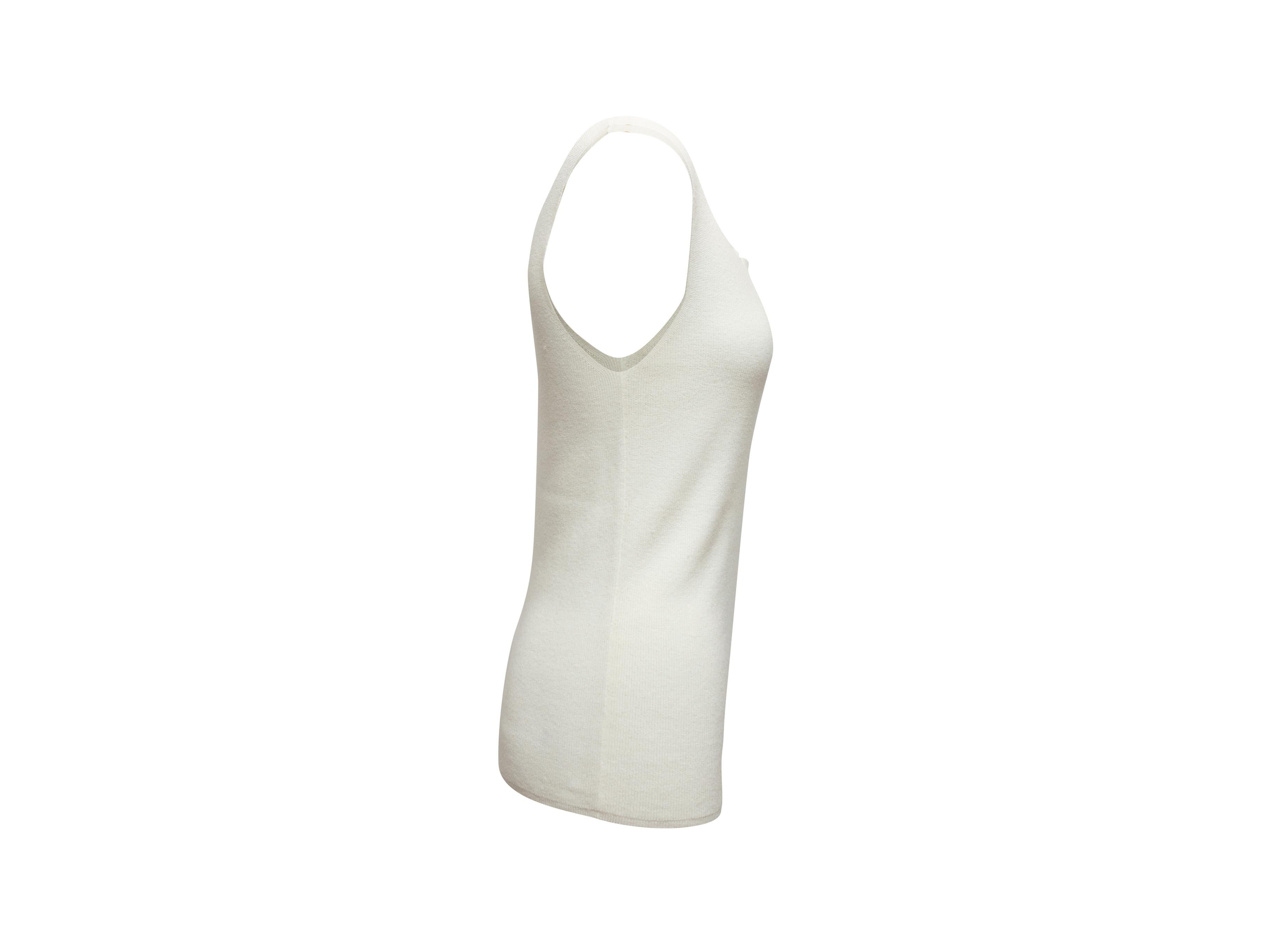 Product details: White sleeveless knit top by Chanel. From the Spring 2005 Collection. Scoop neckline. Designer size 48. 29