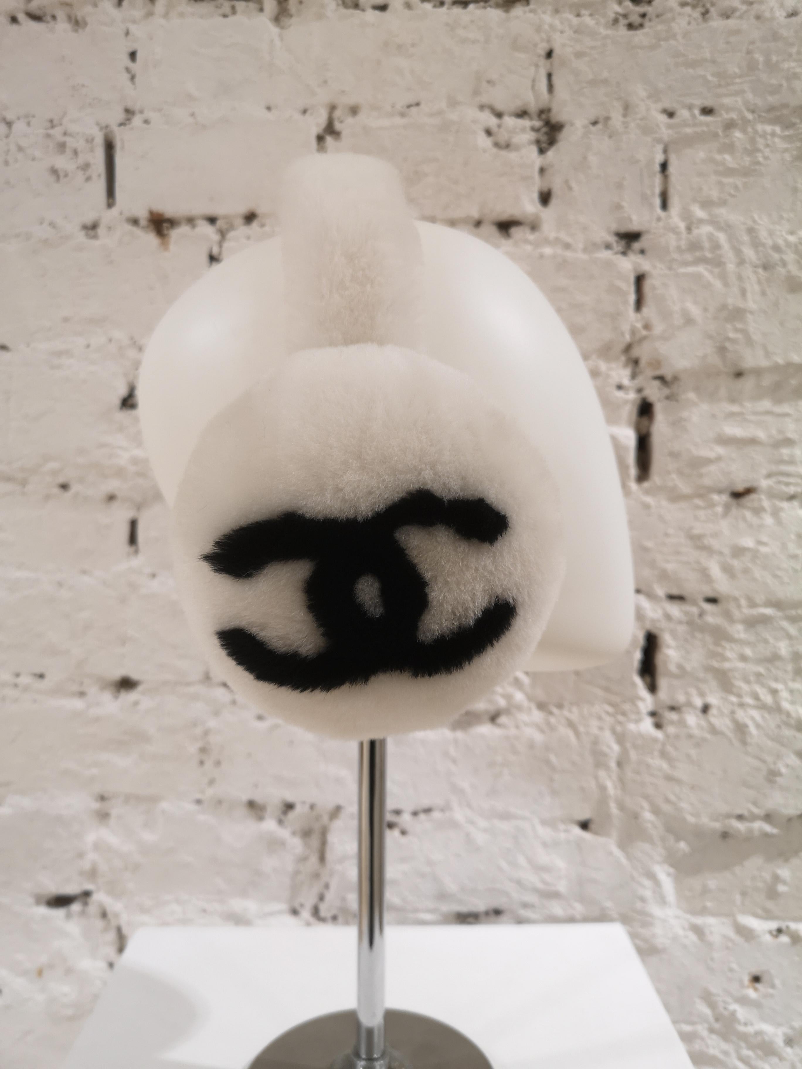 Chanel White with black CC logo earmuffs  1
