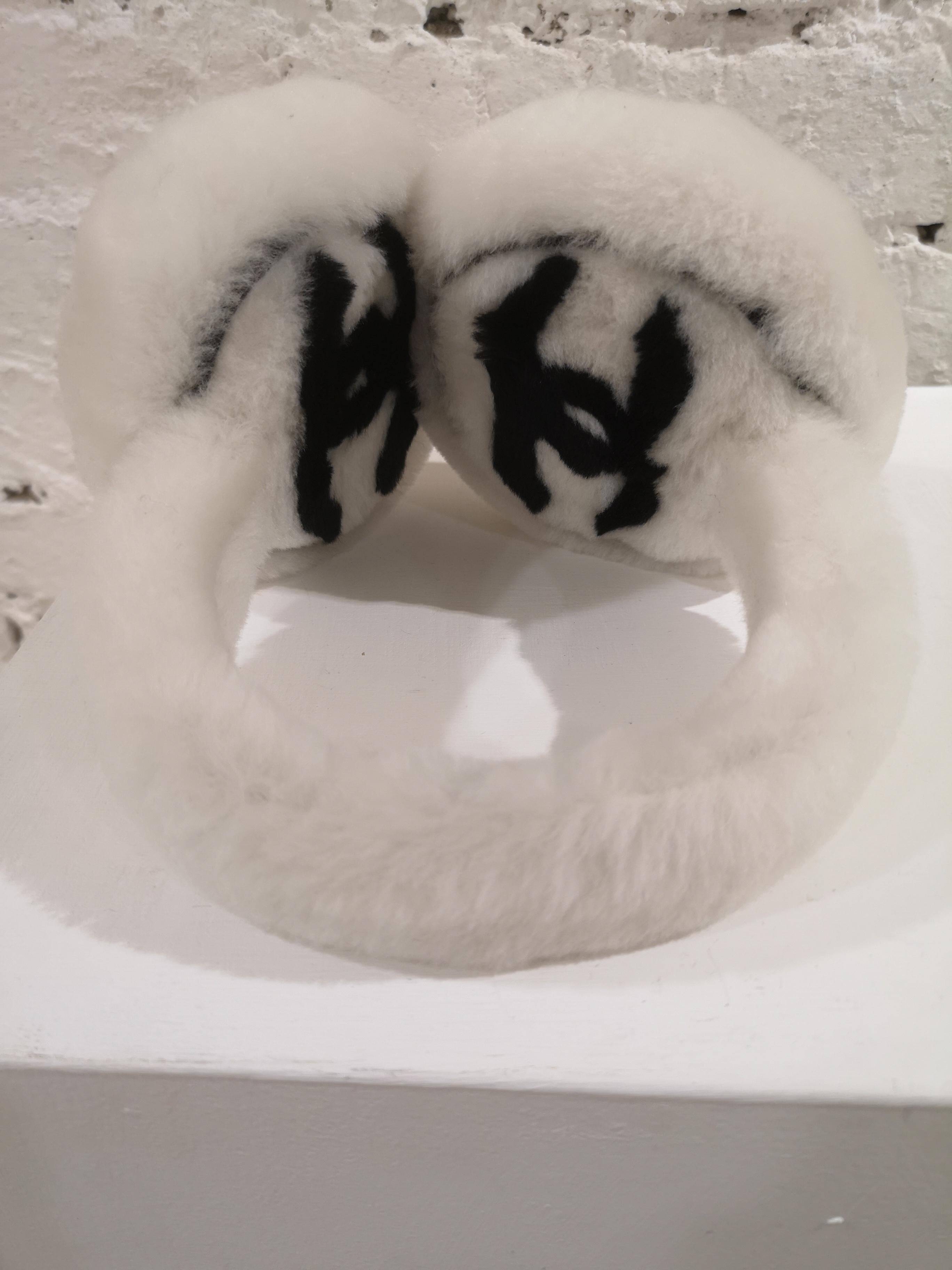 Chanel White with black CC logo earmuffs  3