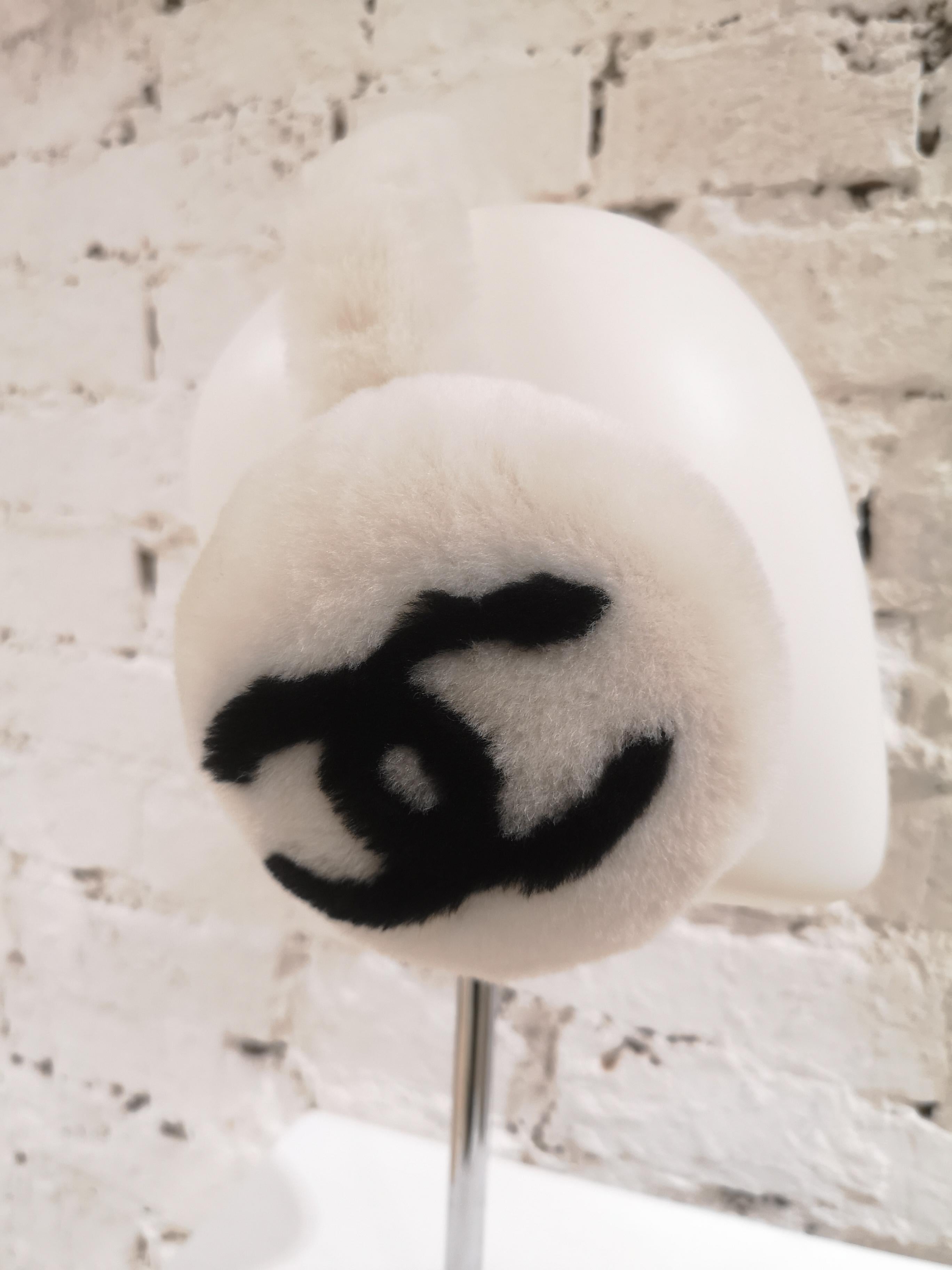 Chanel White with black CC logo earmuffs  In Excellent Condition In Capri, IT