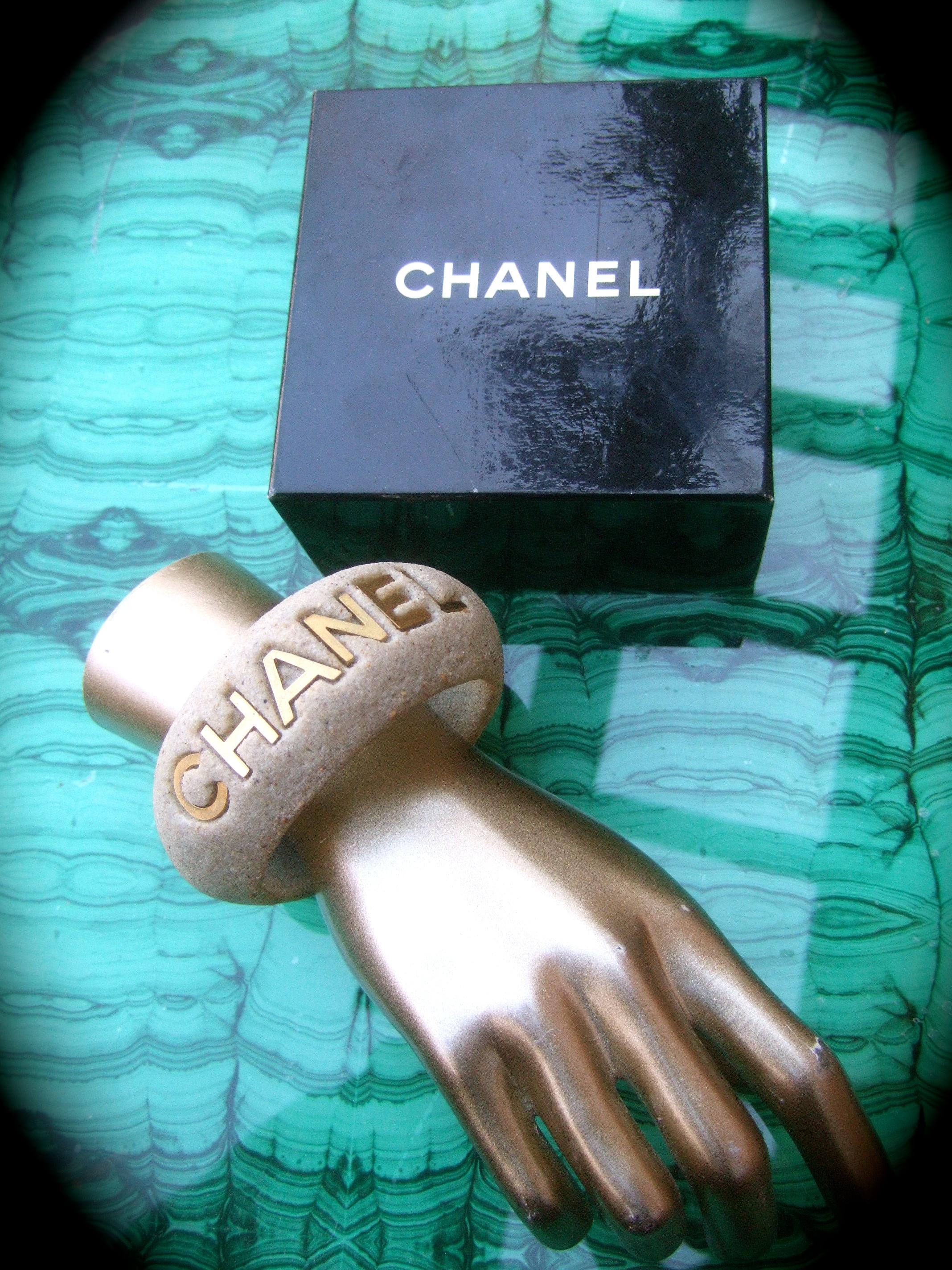 Chanel Wide Molded Bisque Stone Cuff Bracelet in Chanel Presentation Box c 1990s In Good Condition For Sale In University City, MO