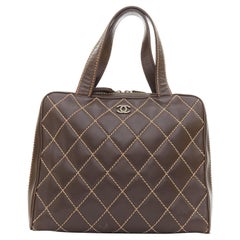 CHANEL Wild Stitch Surpique  brown lambskin leather matelasse bowler bag