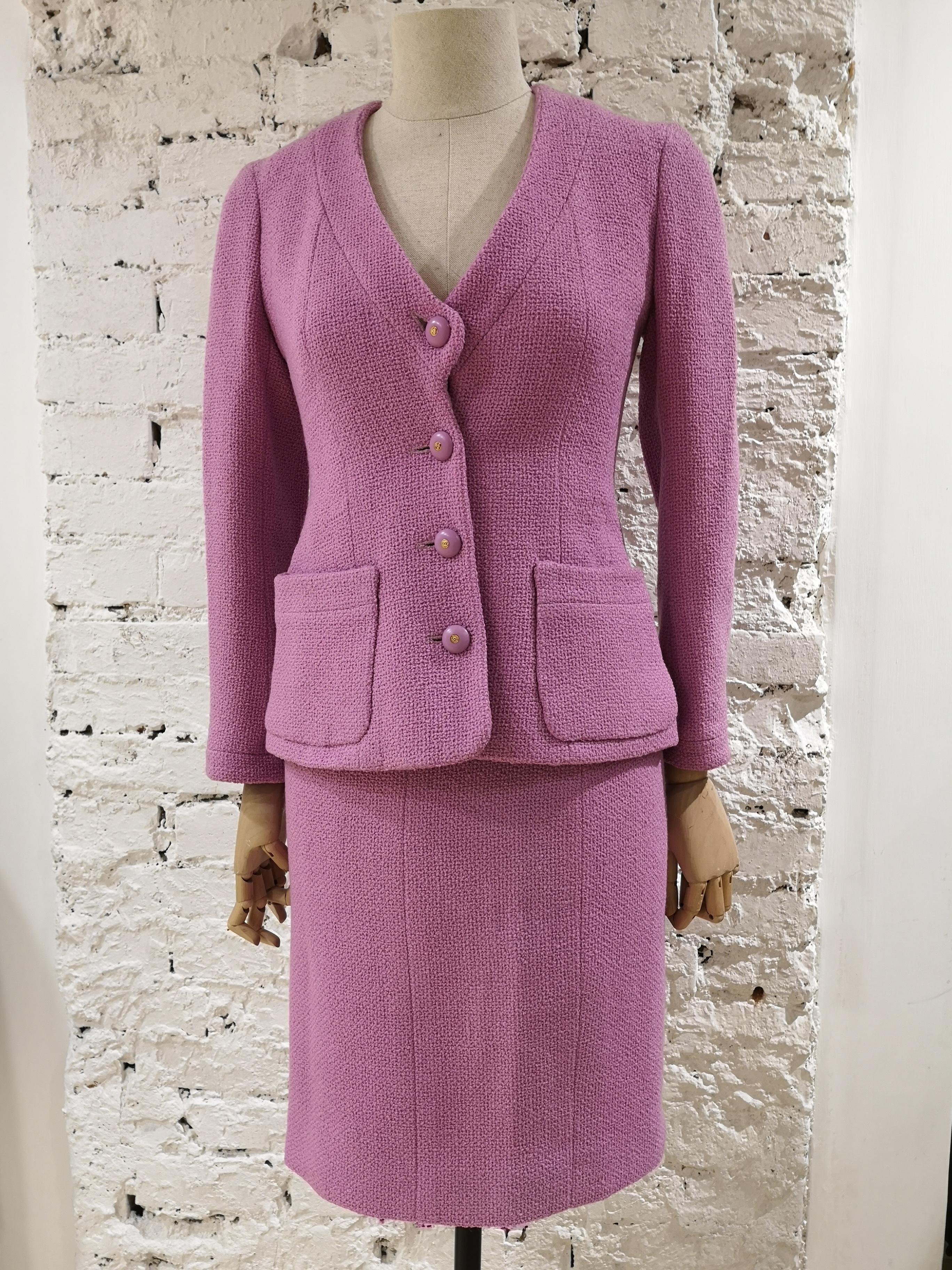 Chanel wisteria Wool Skirt Suit
Chanel wisteria skirt suit embellished with wisteria cc gold tone logo bottons 
totally made in france in size 38
