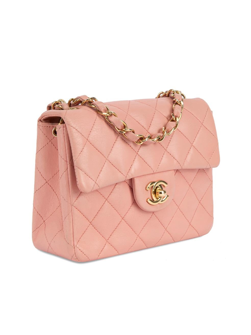 CONDITION is Very good. Minimal wear to bag is evident. Minimal wear to to the leather exterior and bag strap where creasing and scuffs can be seen on this used Chanel designer resale item.   Details  2004/2005 Sakura pink Leather Mini flap bag