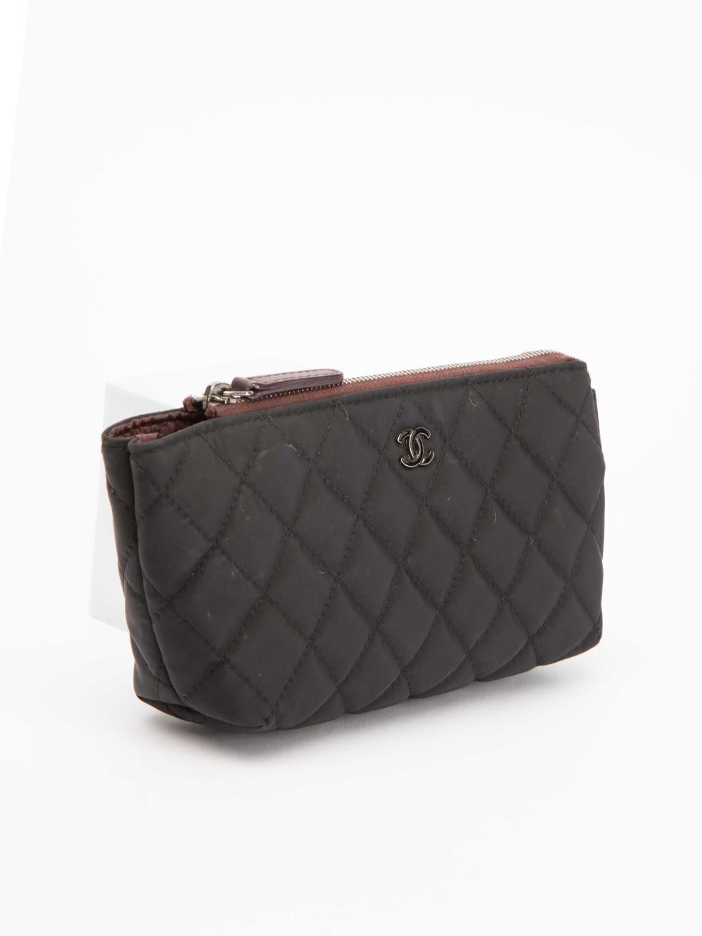 CONDITION is Very good. Minimal wear to pouch is evident. Minimal wear to bag interior which is discoloued from use and, there is also minimal wear to the exterior on this used Chanel designer resale item. 
 
 Details
  Black
 Cloth textile
 Mini