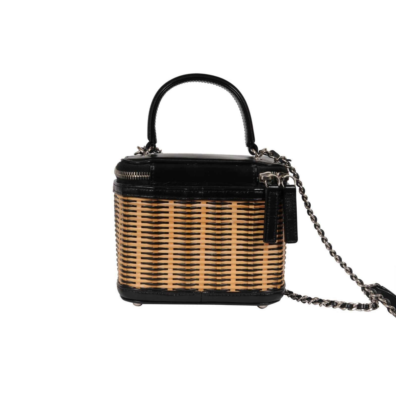 - Black and beige exterior

- Black threaded shoulder strap with a silver chain

- Made in Italy



Condition: 

The bag is in overall great condition with no major imperfections 



Measurements: ( Approximately In Inches ) 

Length: 6.00