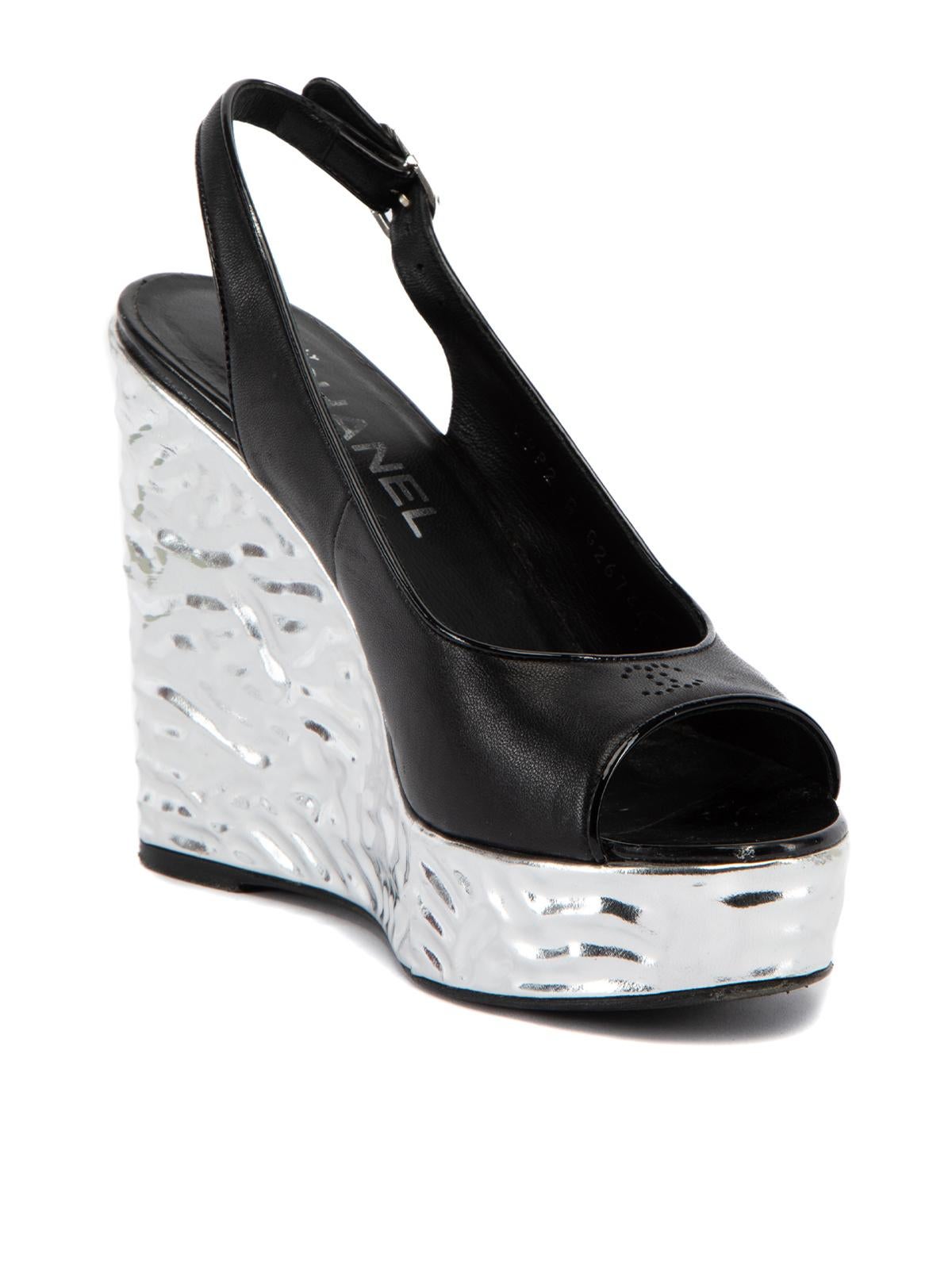 CONDITION is Very good. Minimal wear to heels is evident. Minimal wear to the outsole on this used Chanel designer resale item.   Details  Multicolour- Black and silver Leather  Slingback Peep almond toe Wedge heel Silver metallic scrunch up effect