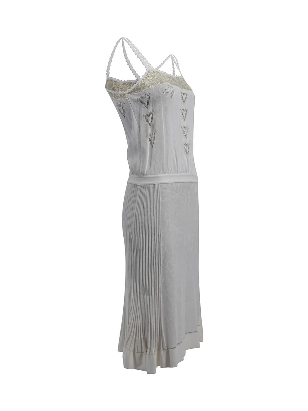 CONDITION is Very good. Hardly any visible wear to dress is evident on this used Chanel designer resale item.   Details  S/S 2006 White and cream Midi dress Strappy Floral lace underlayer Heart shaped lace detail on bodice Pleats on skirt Side