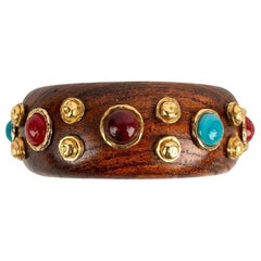 Pulsera Chanel de madera y metal dorado