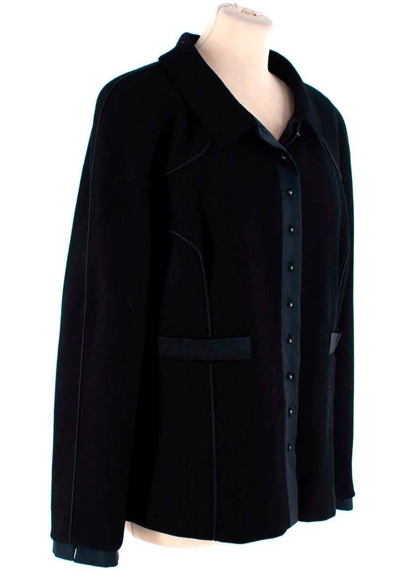 Chanel Wool Crepe Satin Trimmed Jacket
 

 - A stunning, and timeless black crepe jacket with satin detailing, including placket, cuff, pockets, and seamed piping
 - Fitted shape with nipped-in waist as per the Chanel signature 
 - Unusual studded