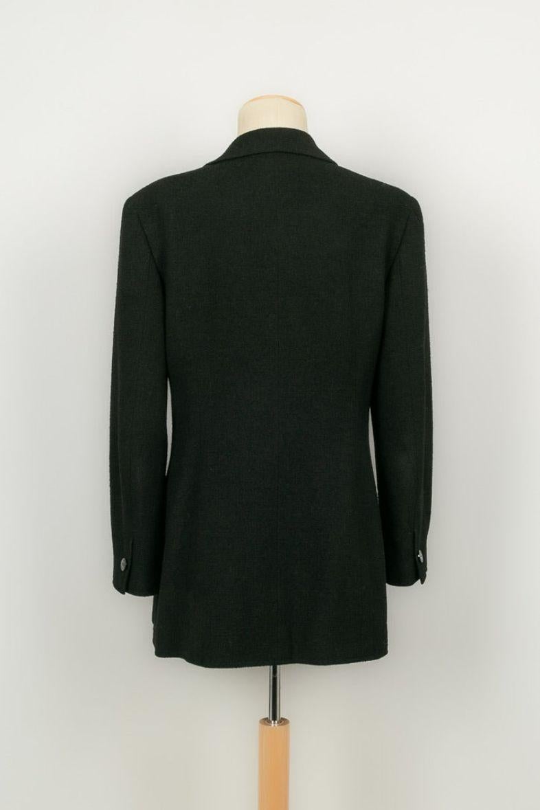 Noir Chanel veste en laine avec doublure en soie en vente