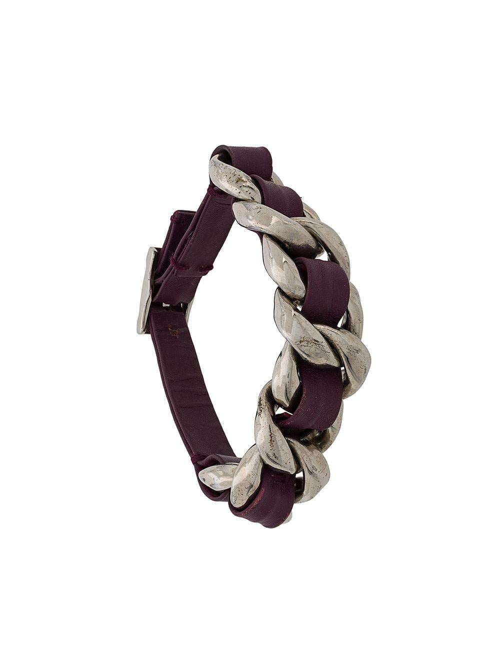 Brimming with romance and sweet femininity, this woven logo bracelet by Chanel is meticulously crafted from an intricate combination of silver-plated metal and purple lambskin leather, features a chain-link design that is full of nods to the