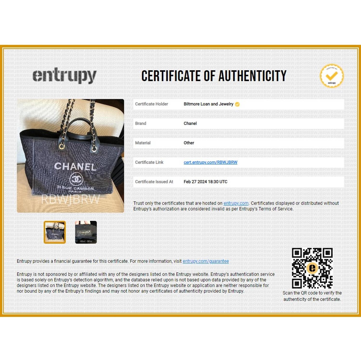 Crafted from fine woven straw raffia, this Chanel Deauville tote boasts a black and gray embroidered Rue Cambon Paris logo on the front. Equipped with leather top handles and a fabric threaded gold chain shoulder strap, it offers functionality with