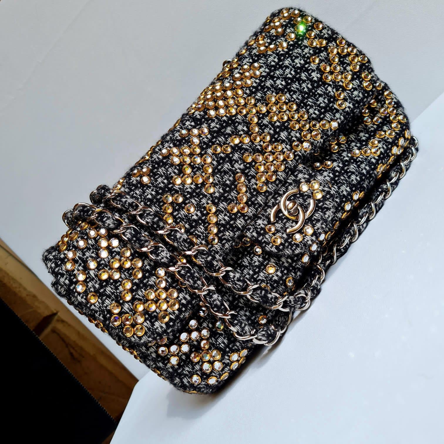 Single Flap Bag Woven tweed classic flap bag with swarovksi embellishments. Overall still in excellent condition. The Swarovski embellishments glistens perfectly under the lights. 

Serial Number: #14016153
Inclusion: Authenticity Card, Dust Bag,