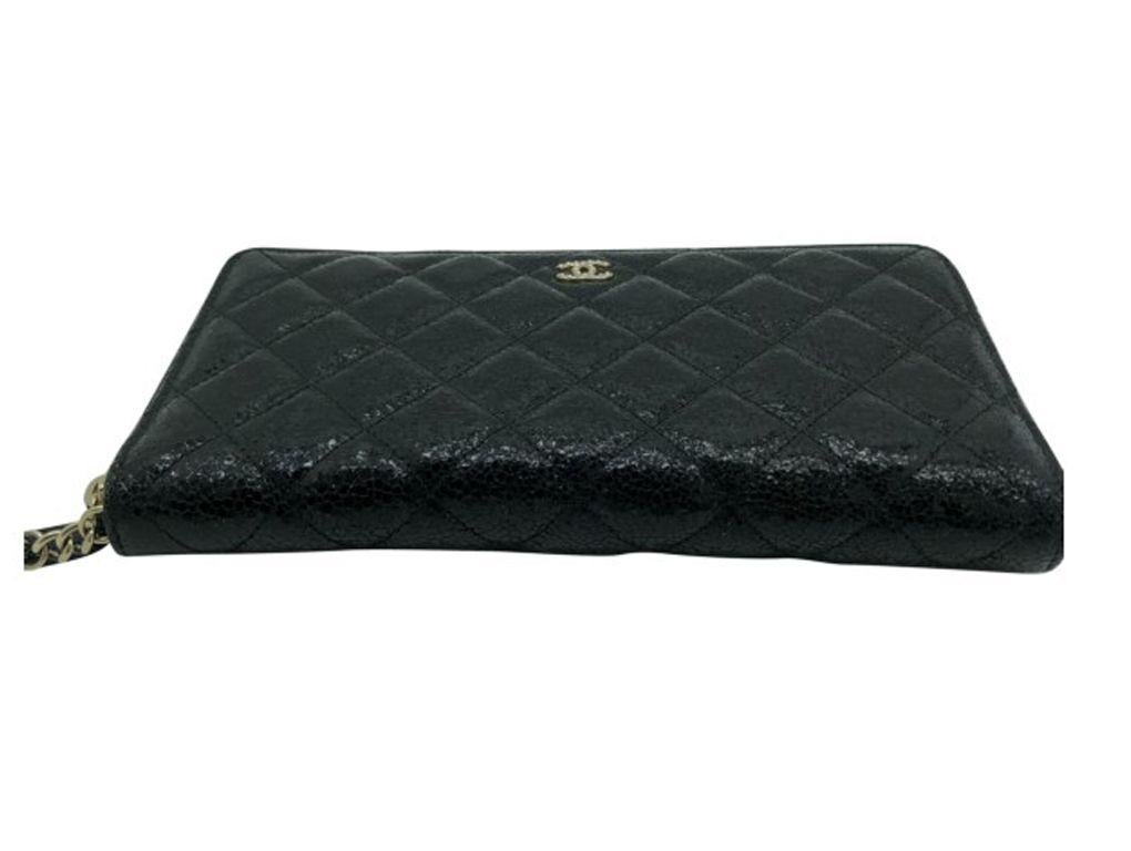 Chanel Cartera de mano/Billetera de viaje Negro en venta