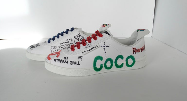 A PAIR OF WHITE & MULTICOLOUR GRAFFITI COCO SNEAKERS, CHANEL x