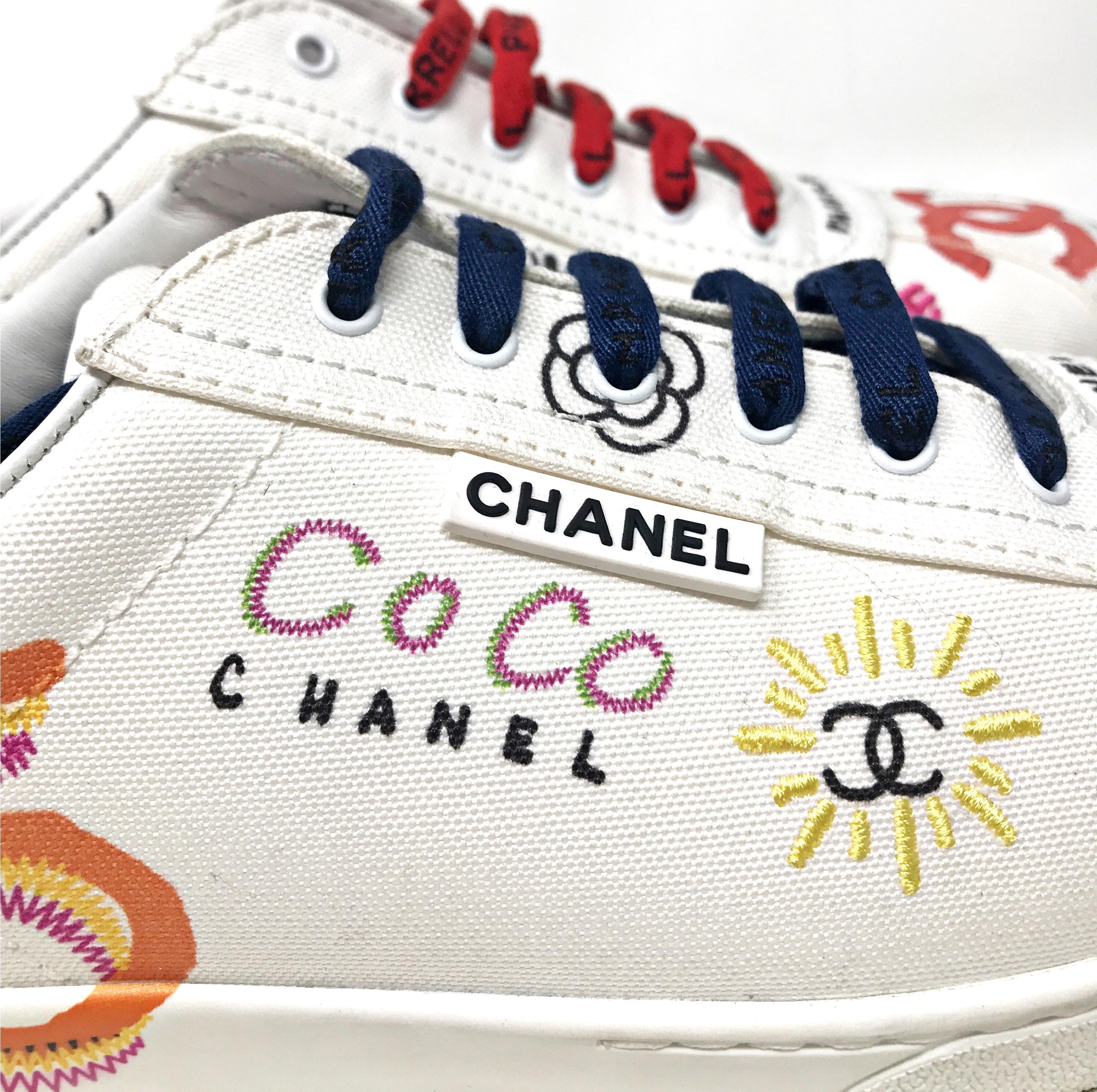 Chanel x Pharrell Capsule Collection Graffiti Sneakers  An urban capsule collection highlighting Pharrell Williams’ longterm relationship with the House of Chanel and initiated by Karl Lagerfeld .  
 Please note:due to camera flashlight color tone