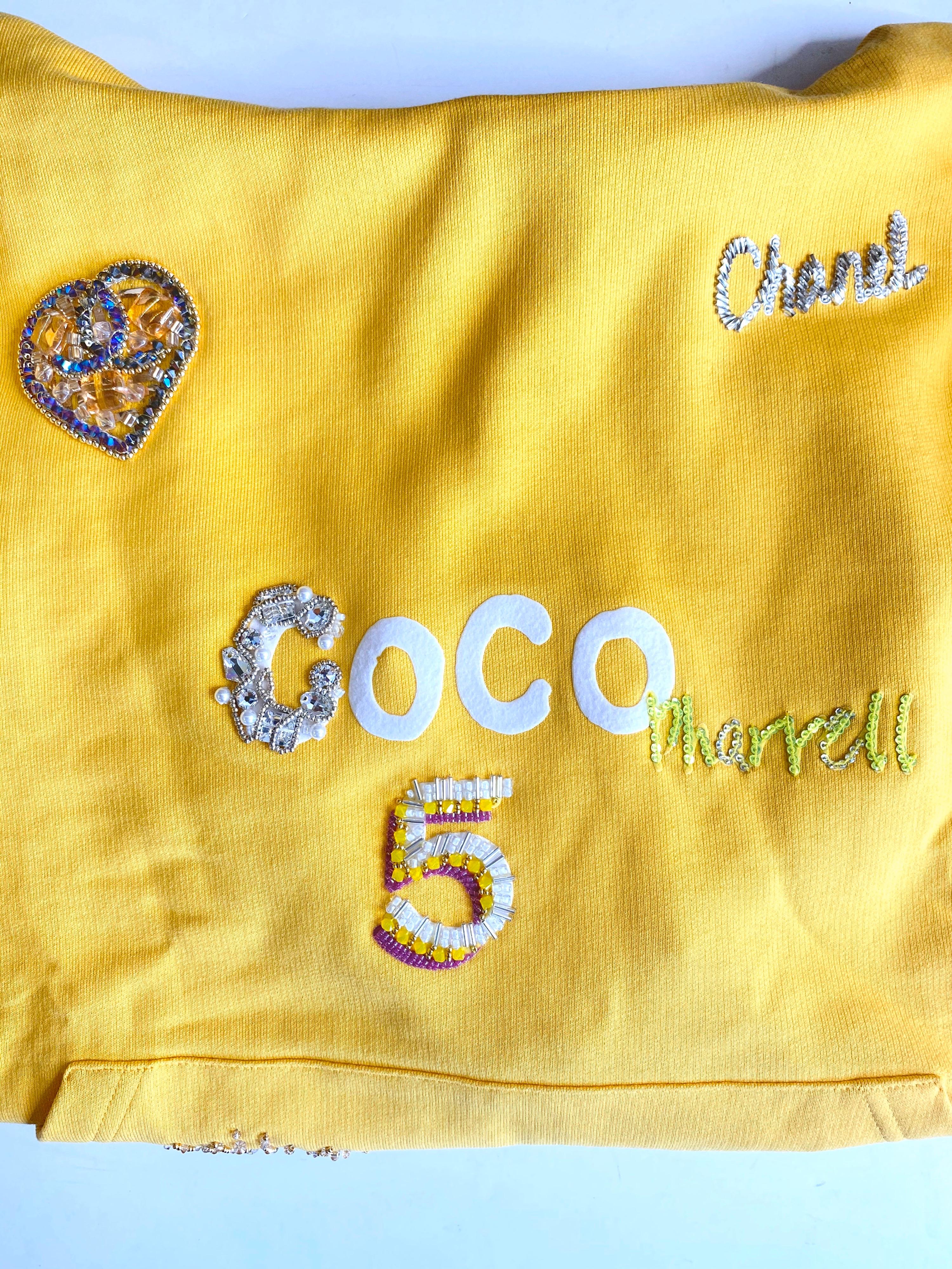 Chanel x Pharrell 2019 Chanel Appliqué Sunflower Yellow Hoodie  In New Condition For Sale In Scottsdale, AZ