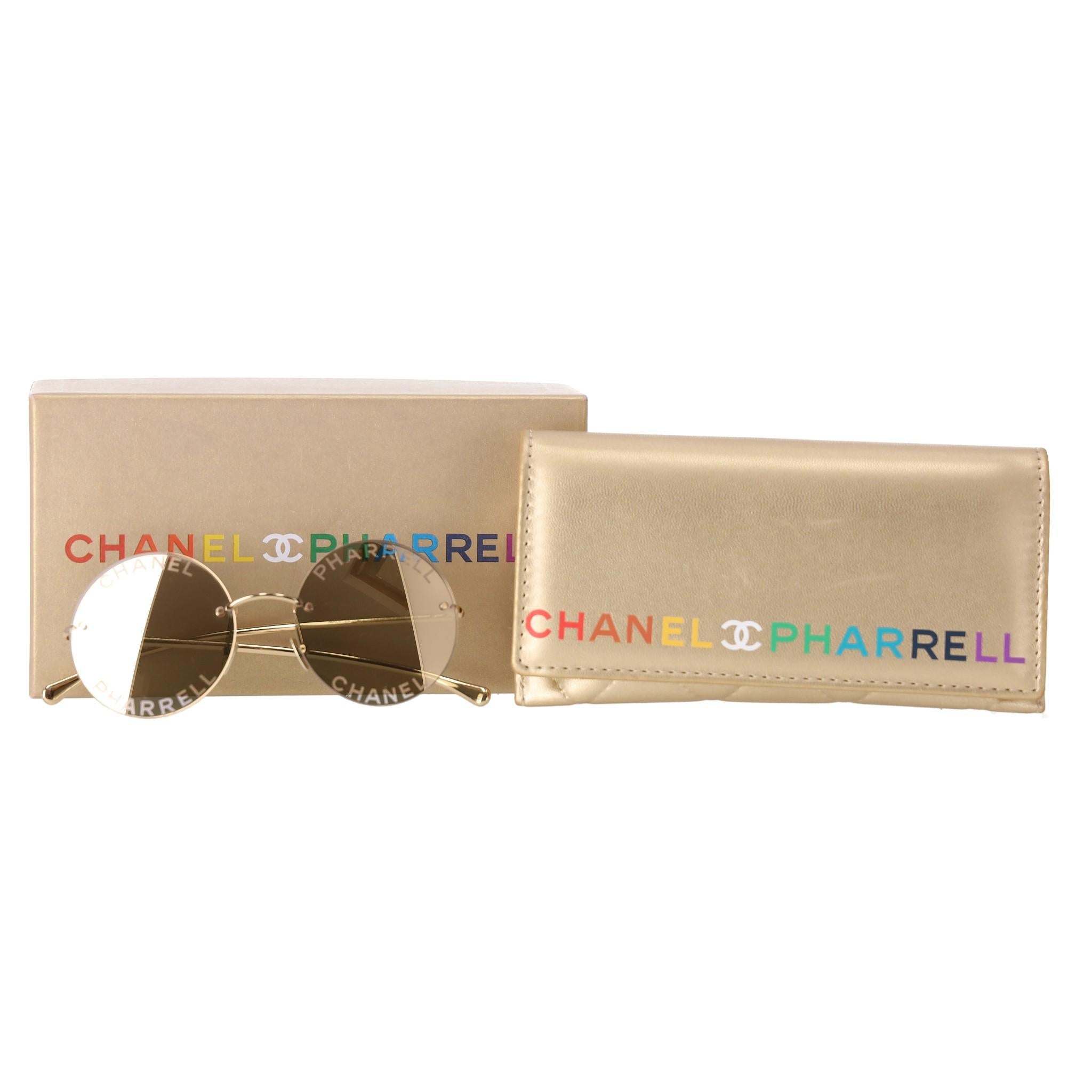 Chanel x Pharrell Williams Gold Plated Round Sunglasses

Round sunglasses  with gold lenses featuring 'CHANEL' and 'PHARRELL' inscriptions, which are a signature touch in the collaboration.

Designed with gold plated arms with iconic 'CC' logo to