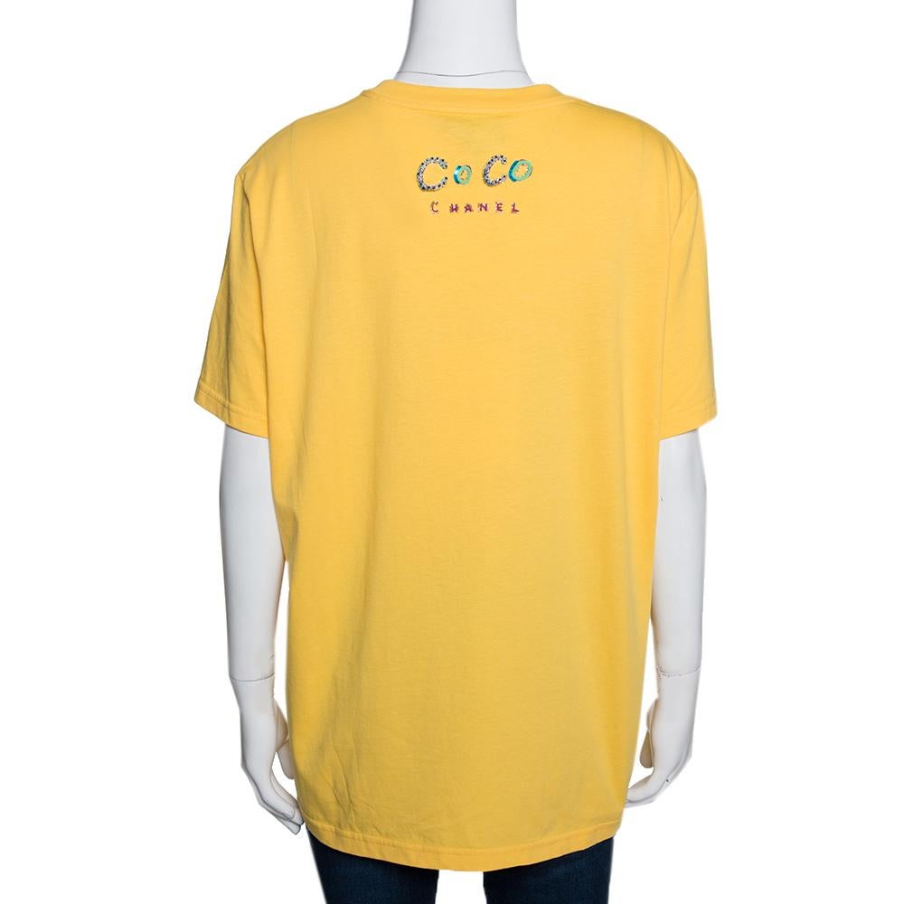 A blend of comfort and style, this yellow t-shirt is exactly what you need to be at the top of your style game. It is from the limited Chanel X Pharrell collection. The luxurious creation is made from cotton and it features short sleeves and