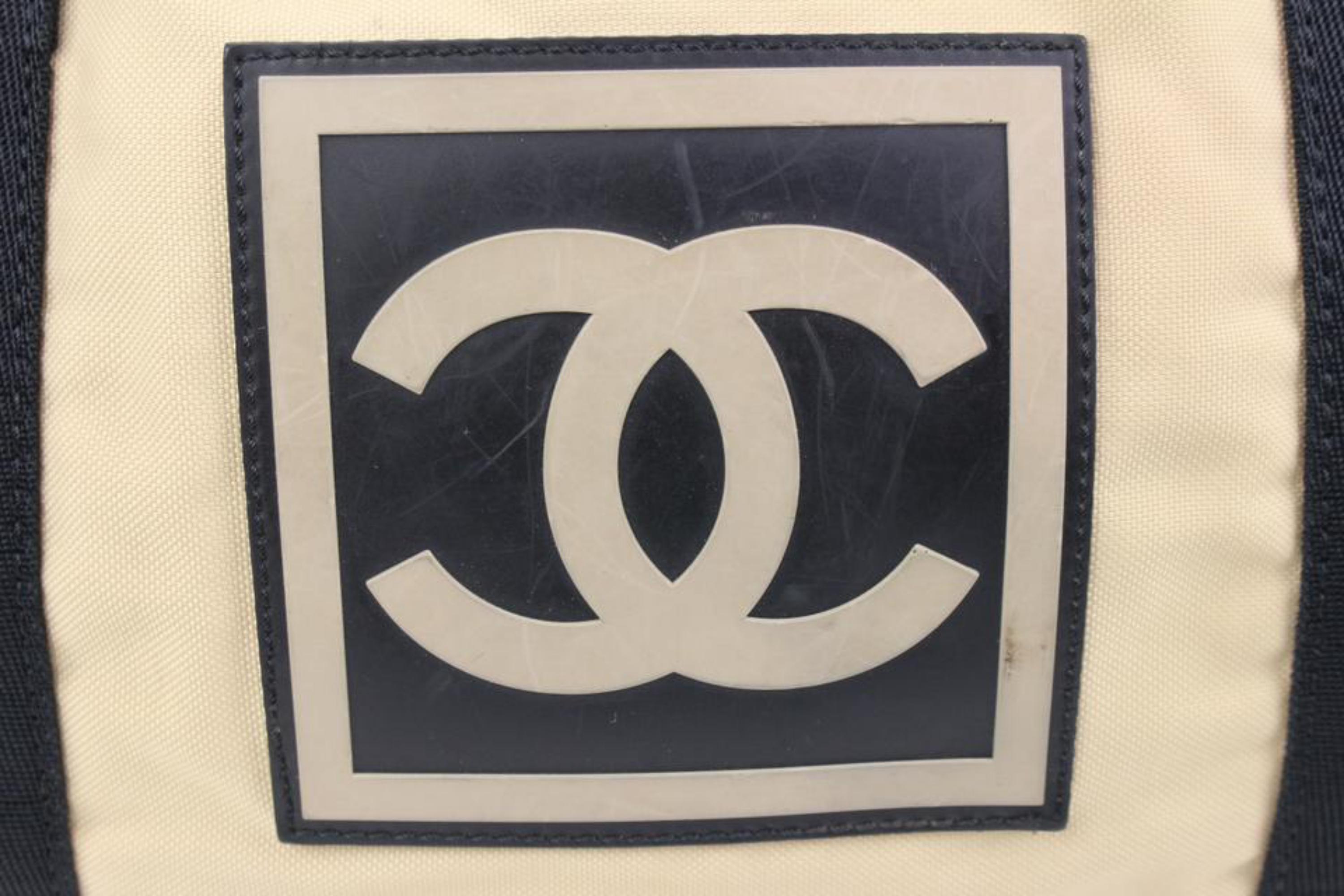 Chanel XL Beige CC Logo Sports Duffle Boston Gym Bag 27cz427s In Fair Condition For Sale In Dix hills, NY