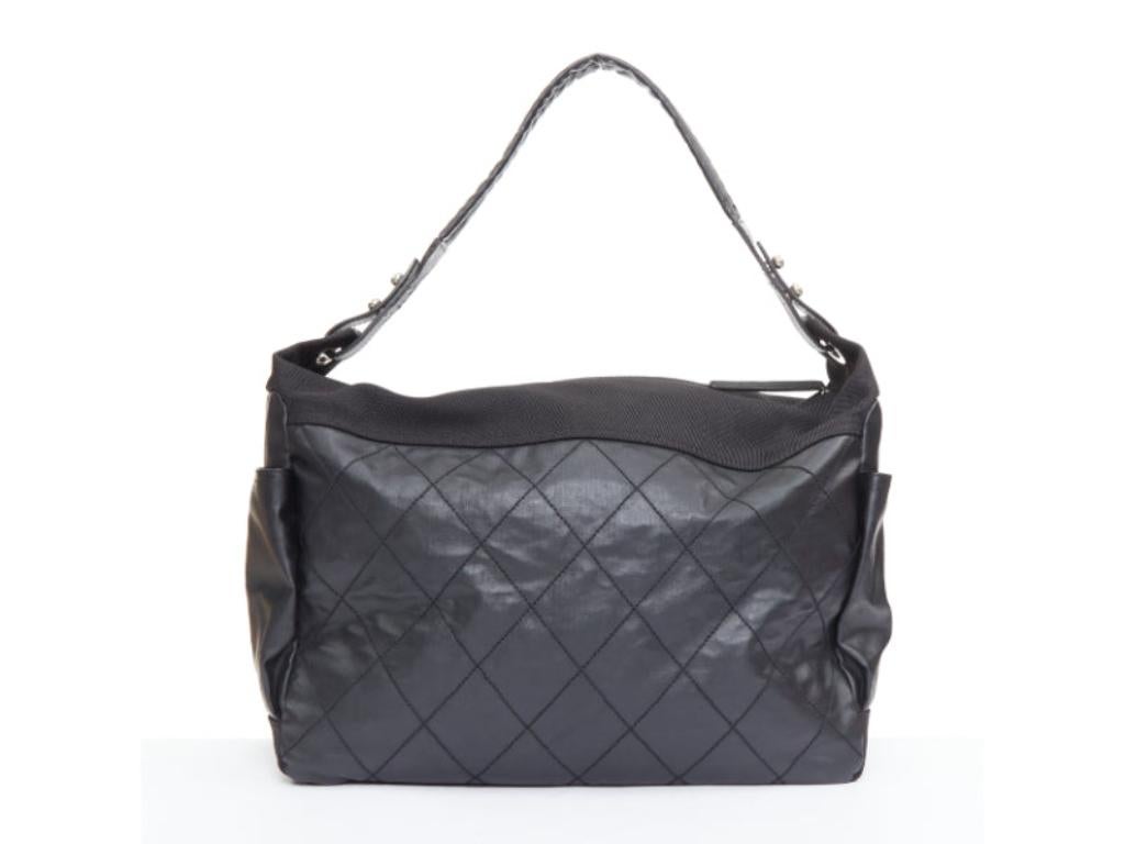 CHANEL XL Paris-Biarritz black coated canvas silver CC crossbody travel hobo bag Pour femmes en vente