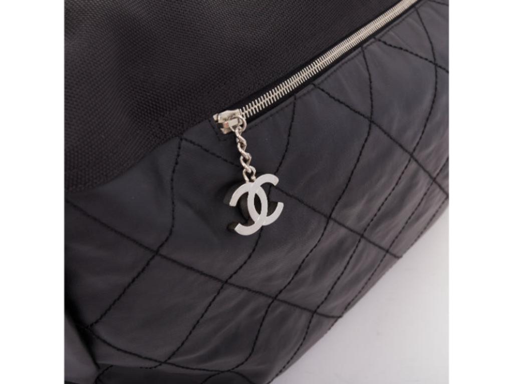 CHANEL XL Paris-Biarritz black coated canvas silver CC crossbody travel hobo bag en vente 1