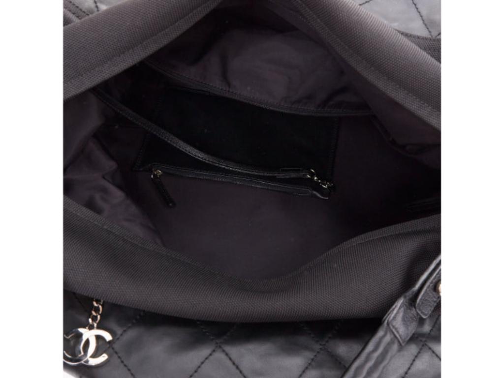 CHANEL XL Paris-Biarritz black coated canvas silver CC crossbody travel hobo bag en vente 4