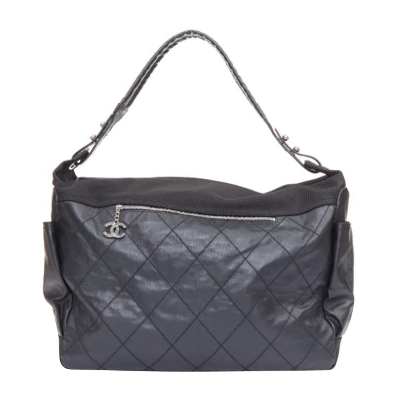 CHANEL XL Paris-Biarritz black coated canvas silver CC crossbody travel hobo bag en vente