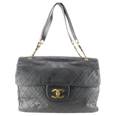 Chanel Vintage Black Quilted Bucket Bag – Dina C's Fab and Funky  Consignment Boutique