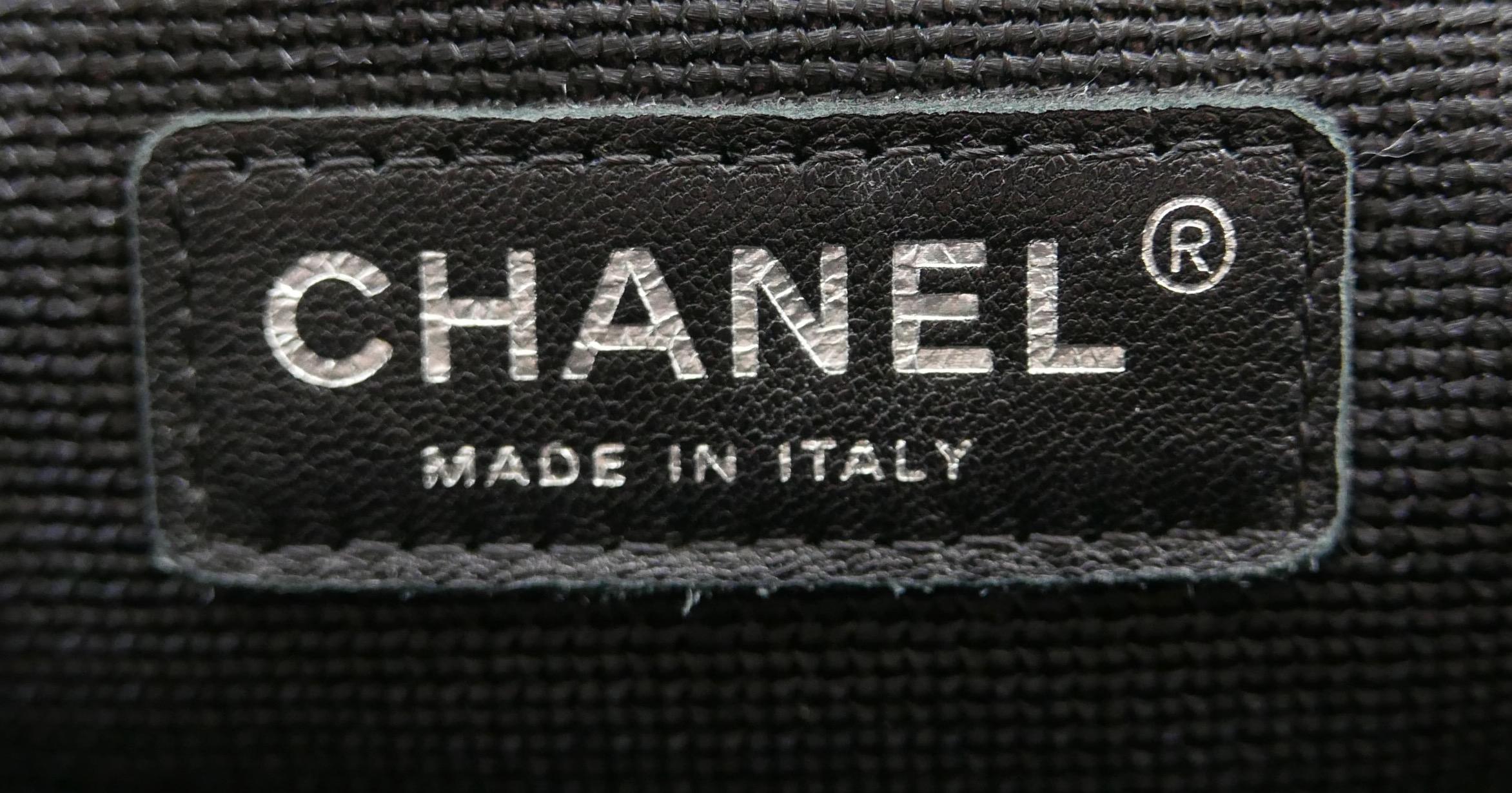 Women's Chanel XXL Travel Flap Bag Black Caviar Leather For Sale