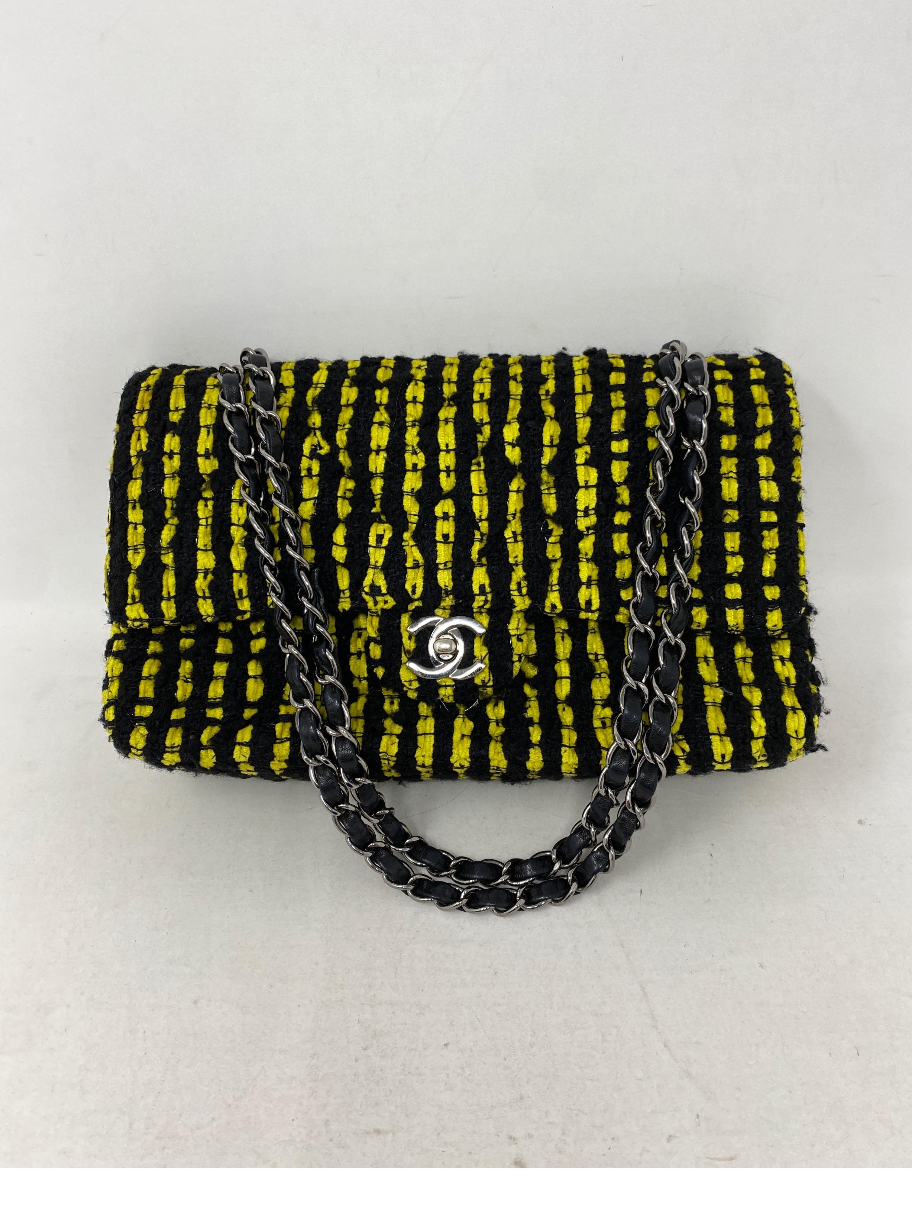 Chanel Yellow and Black Tweed Bag. Double flap bag. Black leather interior. Mint like new condition. Rare and limited collection. Guaranteed authentic. 