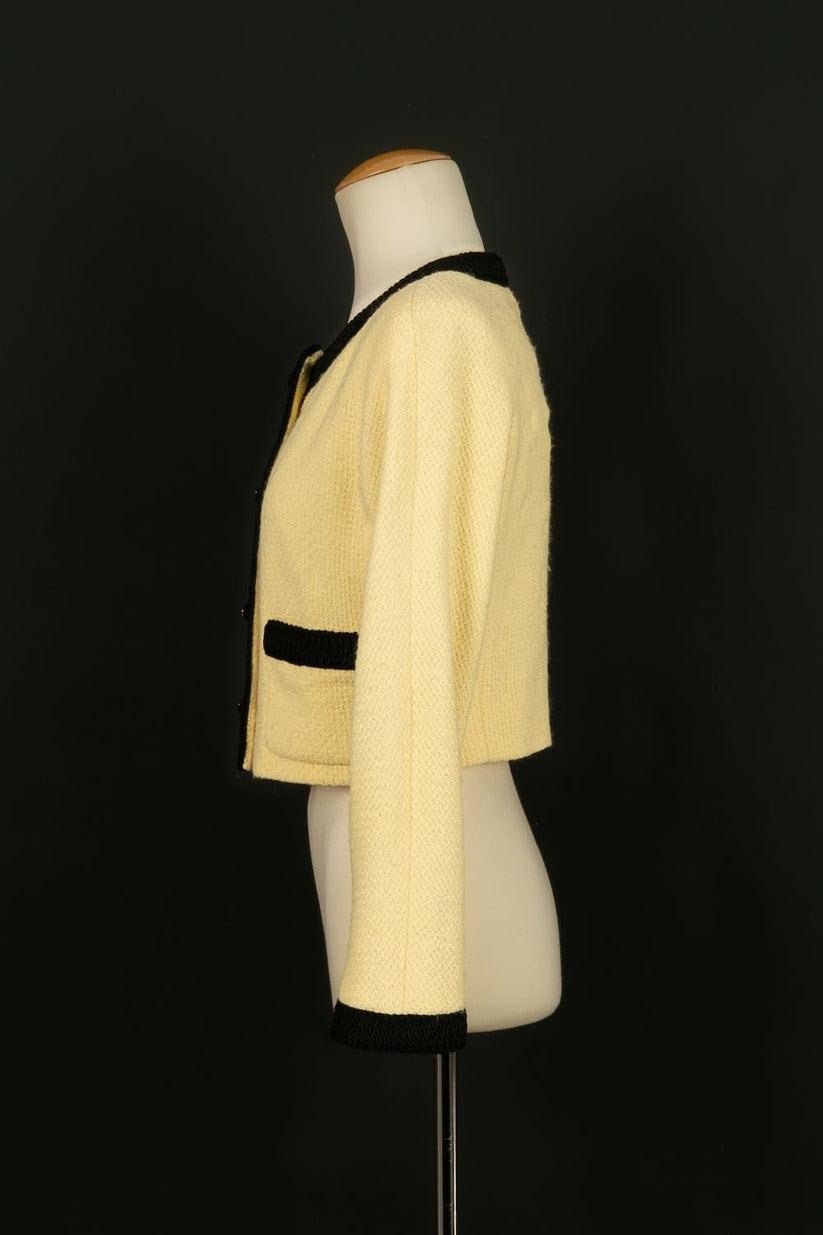 Chanel - (Made in France) Yellow and black wool jacket, silk lining. Size 36FR.

Additional information: 
Dimensions: Shoulder width: 38 cm, Chest: 46 cm, Sleeve length: 55 cm, Length: 43 cm
Condition: Very good condition
Seller Ref number: FV72