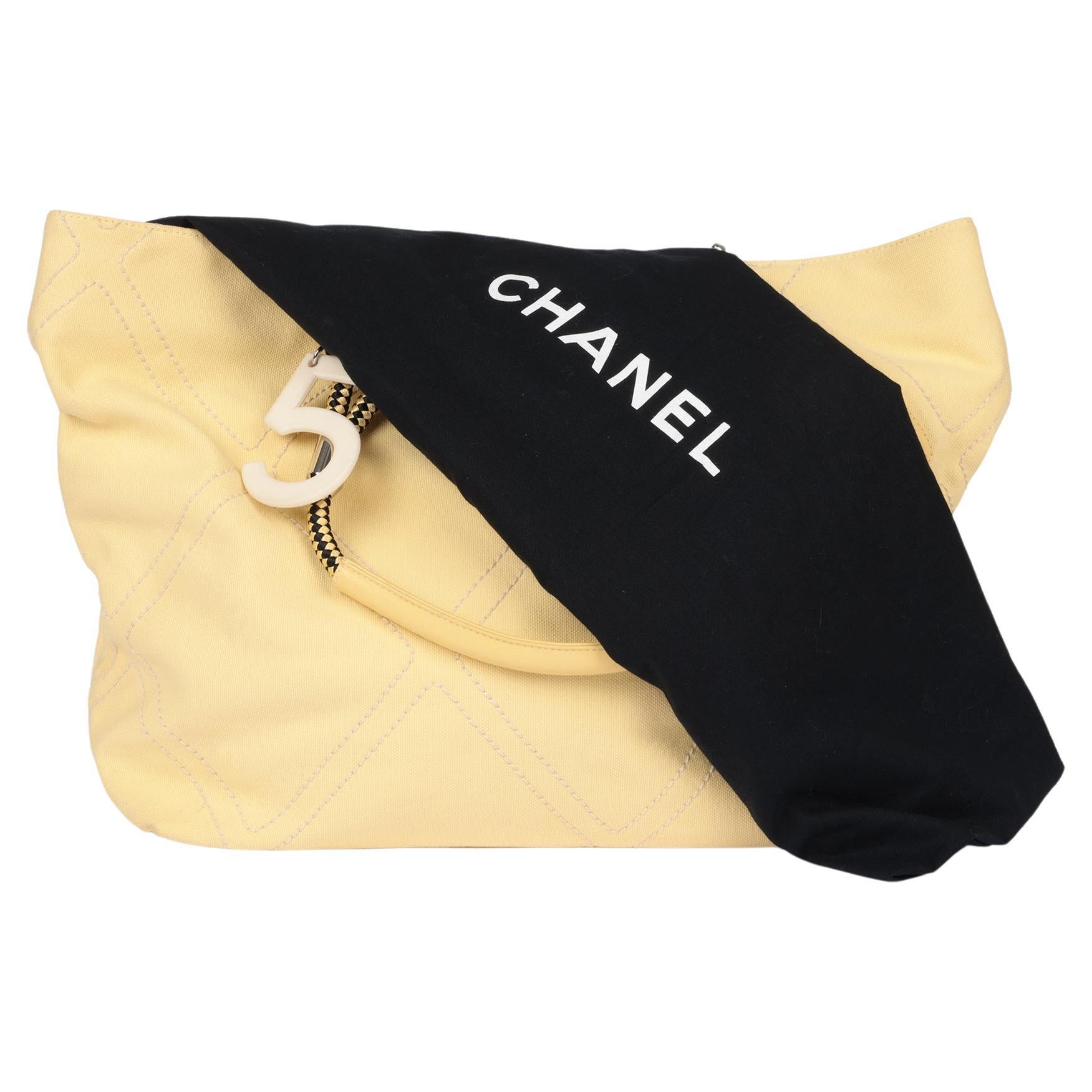 Chanel Yellow Canvas Vintage No.5 Timeless Tote

Brand- Chanel
Model- No.5 Timeless Tote
Product Type- Shoulder, Tote
Serial Number- 96*****
Age- Circa 2004
Accompanied By- Chanel Dust Bag
Colour- Yellow
Hardware- Silver
Material(s)-