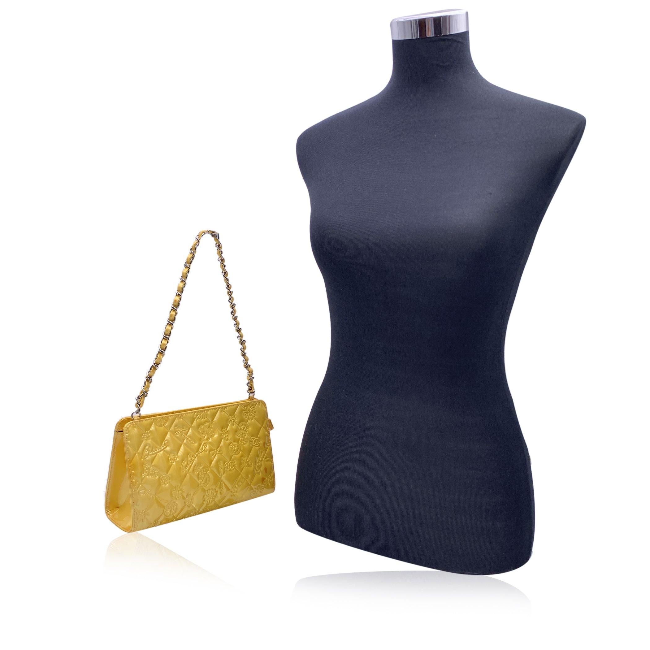 Beautiful Chanel Yellow Embossed Patent Leather 'Lucky Symbols' small bag. From the Cruise 2008-2009 Collection. This bag is beautifully crafted from yellow quilted patent leather with embossed lucky Chanel charms and silver-tone hardware. Upper