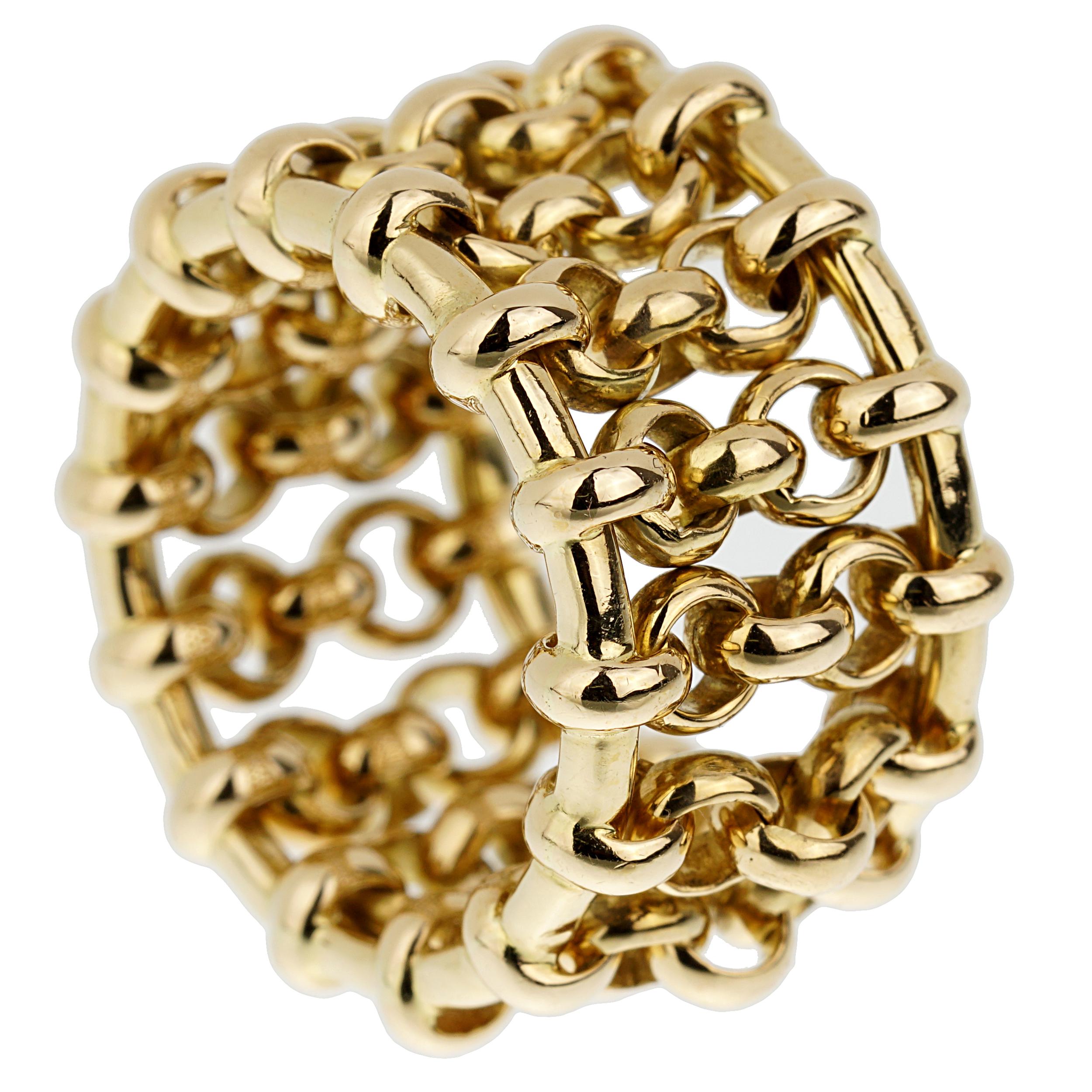 A chic Chanel ring circa 1990s showcasing a chain link motif crafted in 18k yellow gold, the ring measures .55