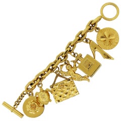 Chanel Yellow Gold Tone Multi Charm Bracelet