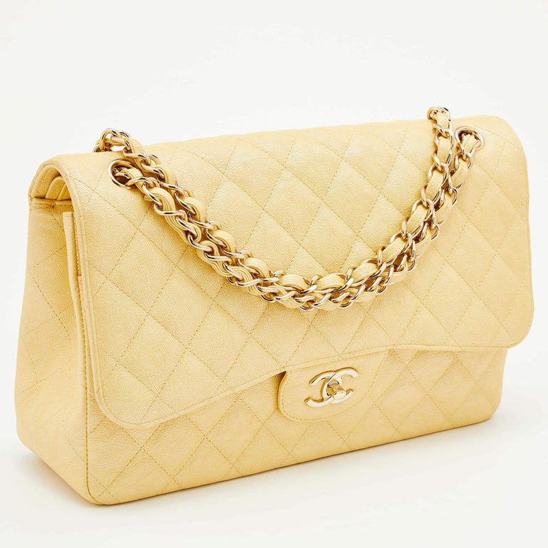 Chanel Beige Quilted Caviar Jumbo Classic Double Flap Bag – Madison Avenue  Couture