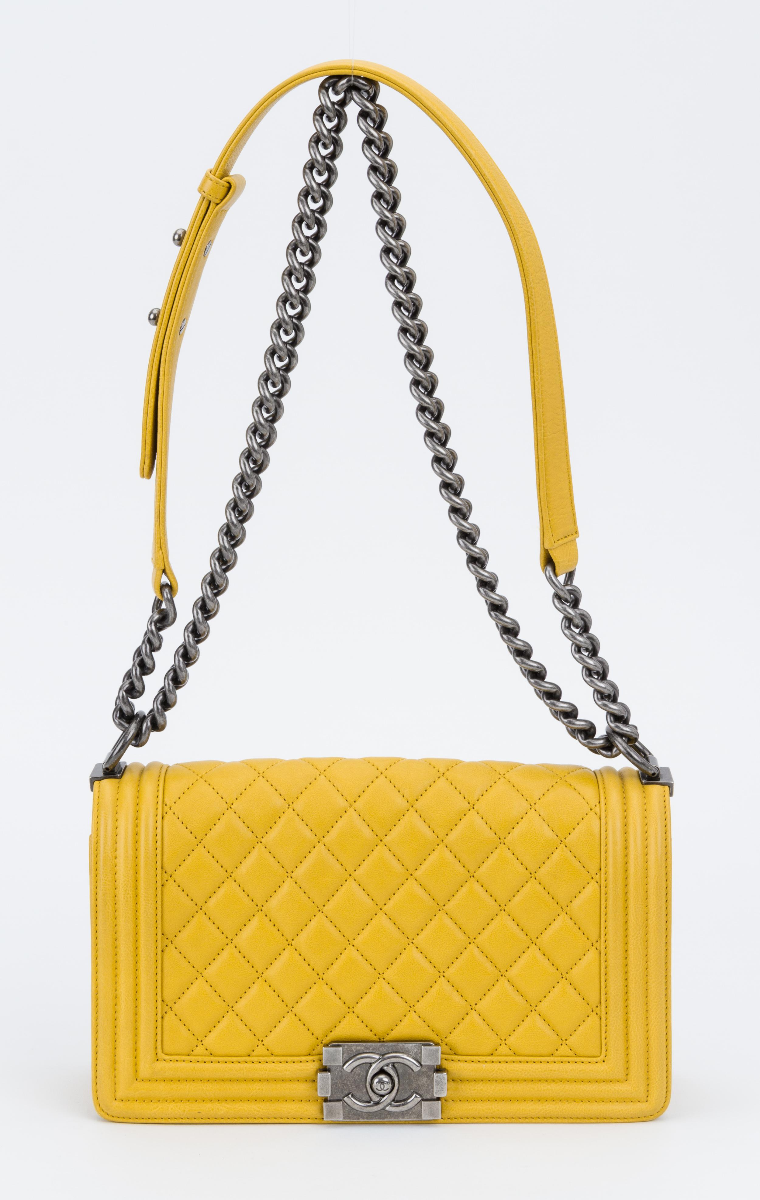 Chanel medium boy bag in yellow leather with ruthenium hardware. Shoulder drop, 11