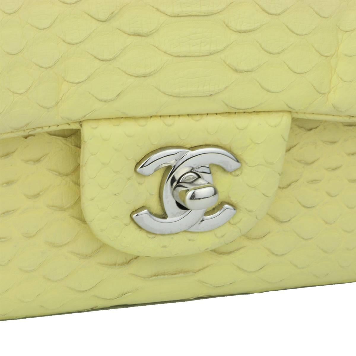 Authentic CHANEL Yellow Python Rectangular Mini with Silver Hardware 2014 Limited Edition.

This stunning bag is still in Excellent condition. The bag still holds its original shape and hardware still shiny.

Exterior Condition: Excellent condition.