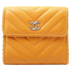 Vintage Chanel Yellow Quilted Chevron Leather CC Studs Trifold Wallet