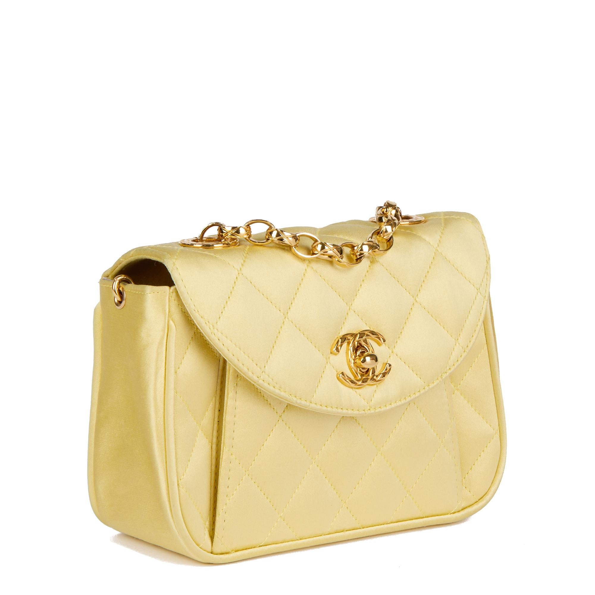CHANEL
Yellow Quilted Satin Vintage Mini Flap Bag

Serial Number: 2415763
Age (Circa): 1992
Accompanied By: Chanel Dust Bag, Box, Authenticity Card, Ribbon
Authenticity Details: Authenticity Card, Serial Sticker (Made in France)
Gender: Ladies
Type: