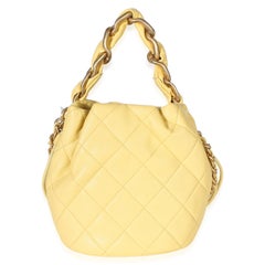 Chanel Yellow Quilted Shiny Lambskin Chain Is More Mini Bucket Bag