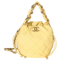 Chanel Yellow Quilted Shiny Lambskin Chain Is More Mini Bucket Bag