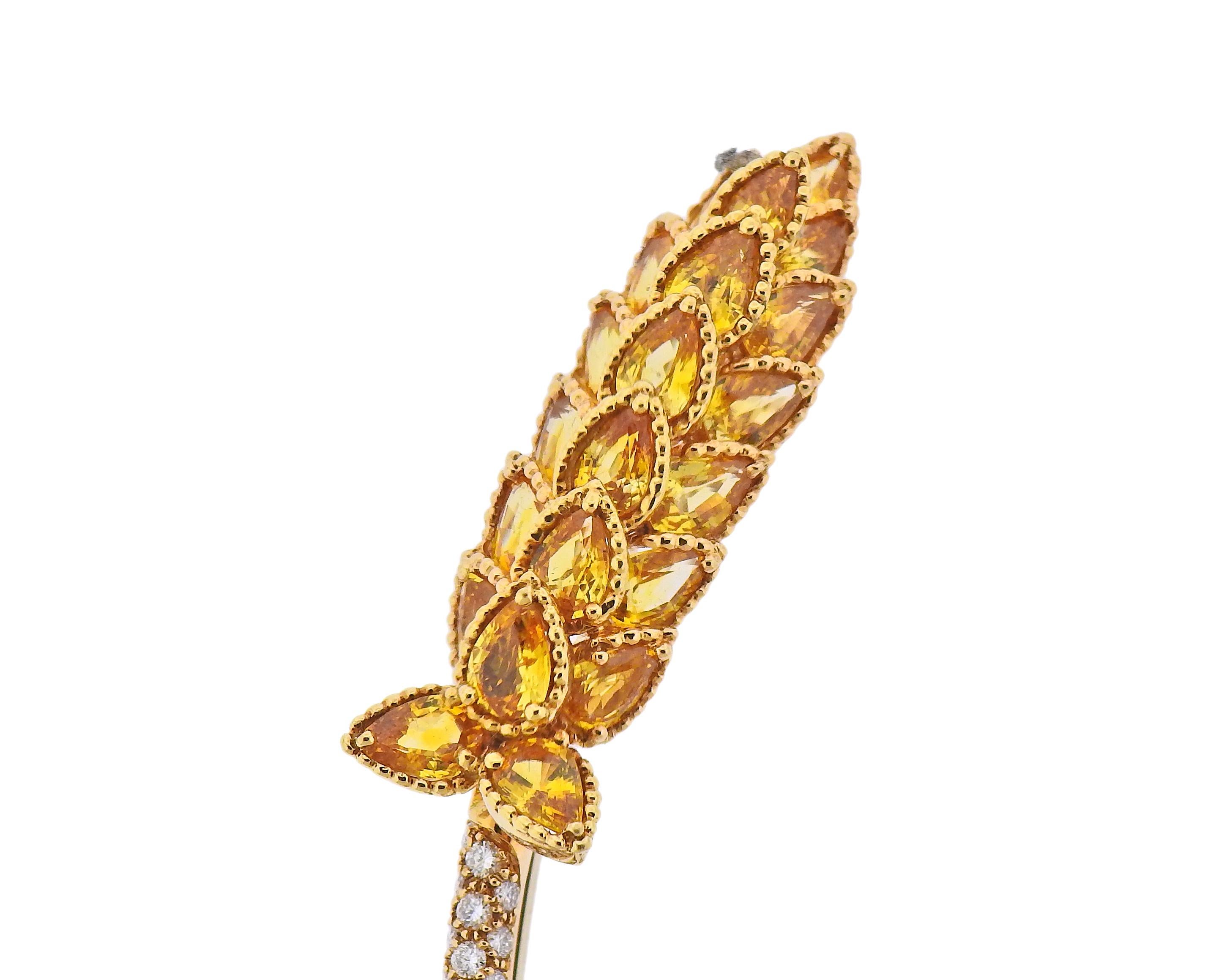 18k gold brooch, designed by Chanel, set with yellow sapphires and approx. 1.40ctw in diamonds. Brooch measures 90mm x 14mm. Marked: Chanel, 7 D 41, or 750. Weight - 18.4 grams.