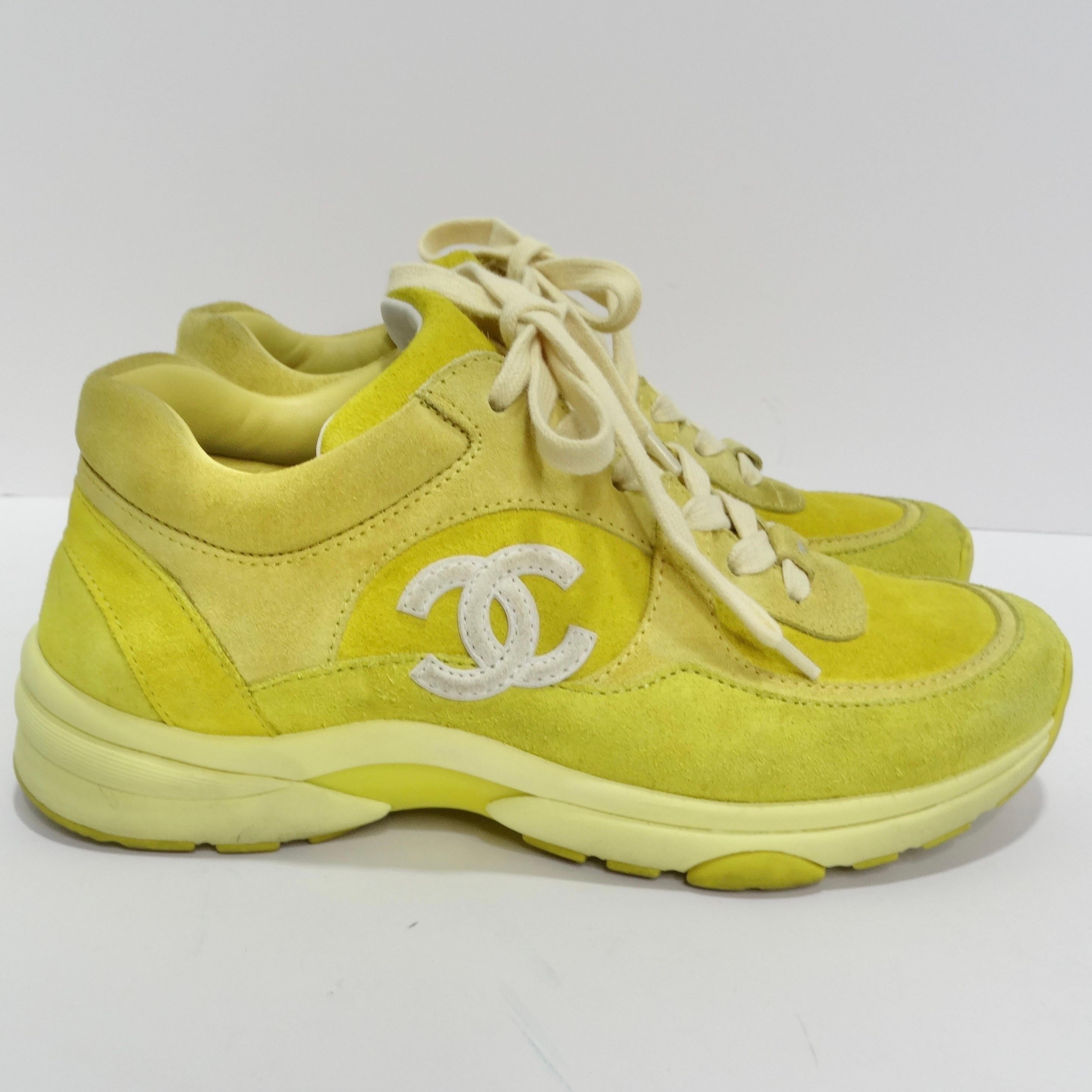 Elevate your sneaker game with the unmistakable allure of Chanel. Introducing the Chanel Yellow Suede Trainers, a perfect blend of iconic style and bold sophistication. Crafted in luxurious yellow suede, these sneakers are a true embodiment of