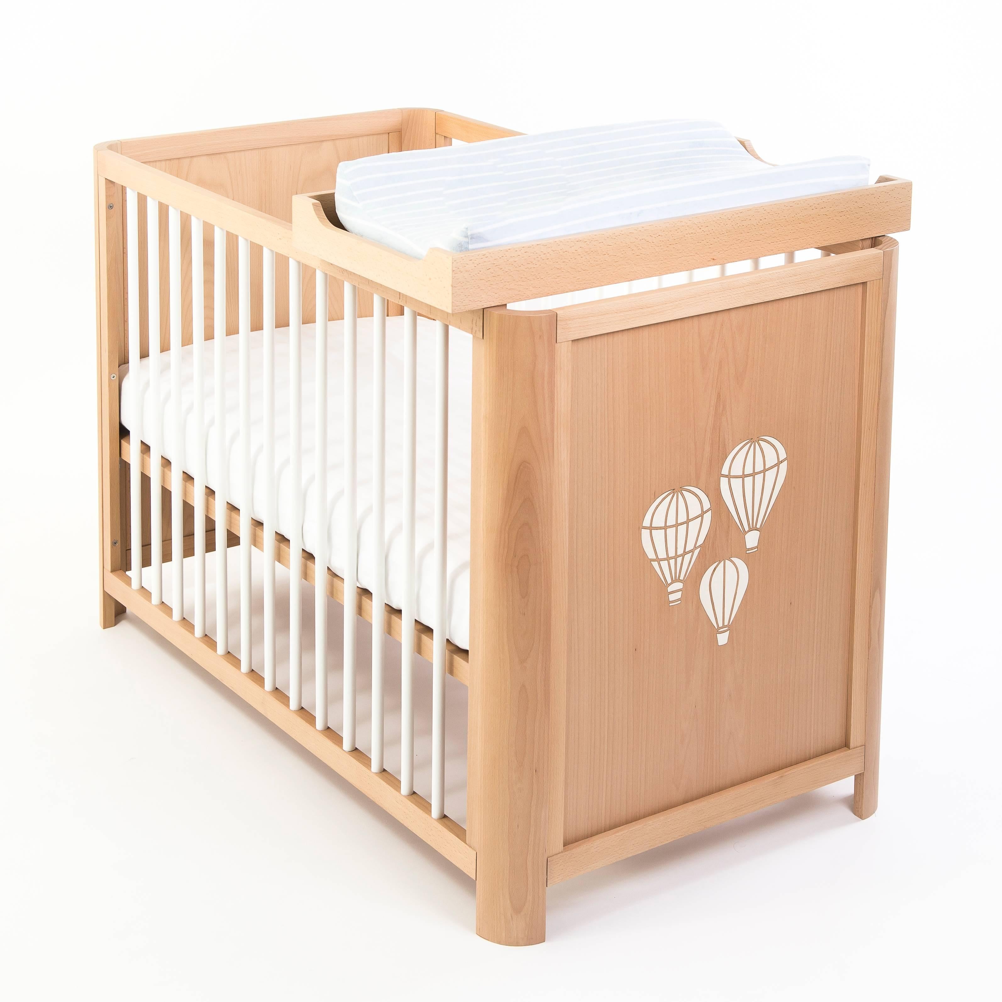 The Oasis changer offers a space-saving solution to changing baby safely and securely, using your MISK nursery crib as its platform. A smooth natural wood finish offers boundless options to mix and match with any nursery. Handmade with care.