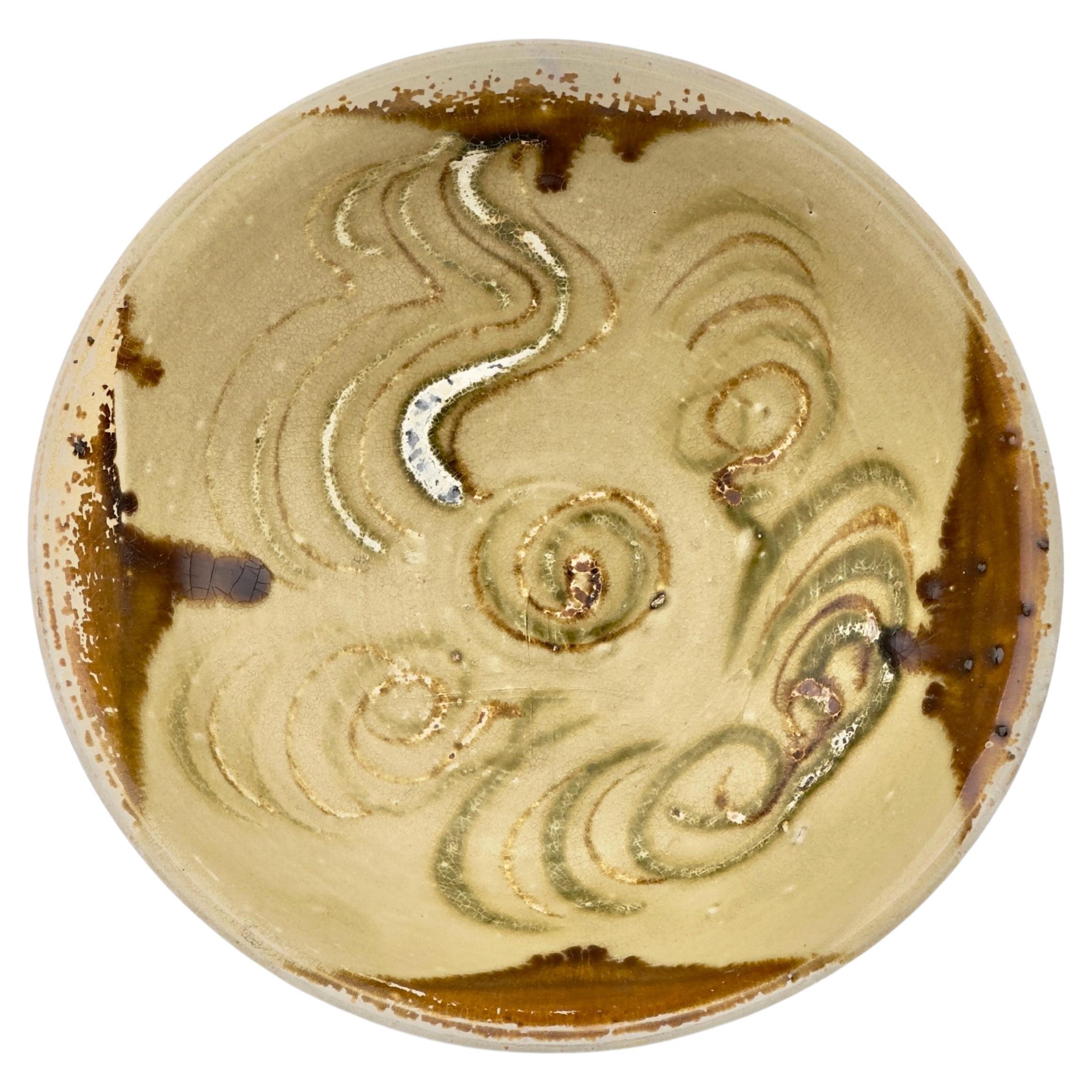 Changsha bowl with cloud or wind patterns, Tang Dynasty