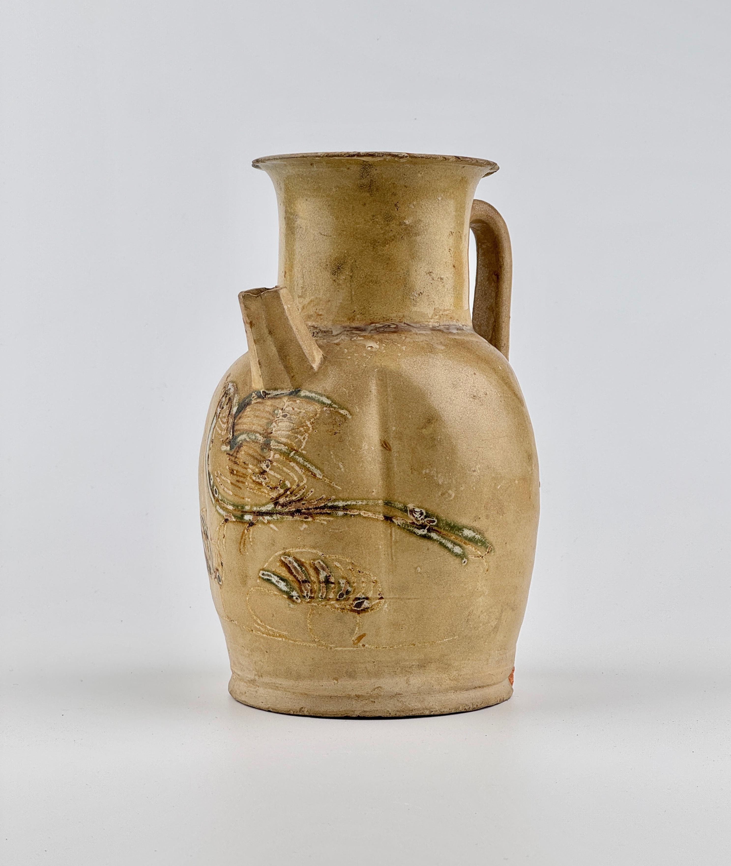 Changsha Ware has distinct and recognizable designs and motifs. Painted designs often depict flowers, vines, clouds and mountain landscapes. Some painting is simply splotches of color that accentuate stamped and molded clay ornaments. You can see